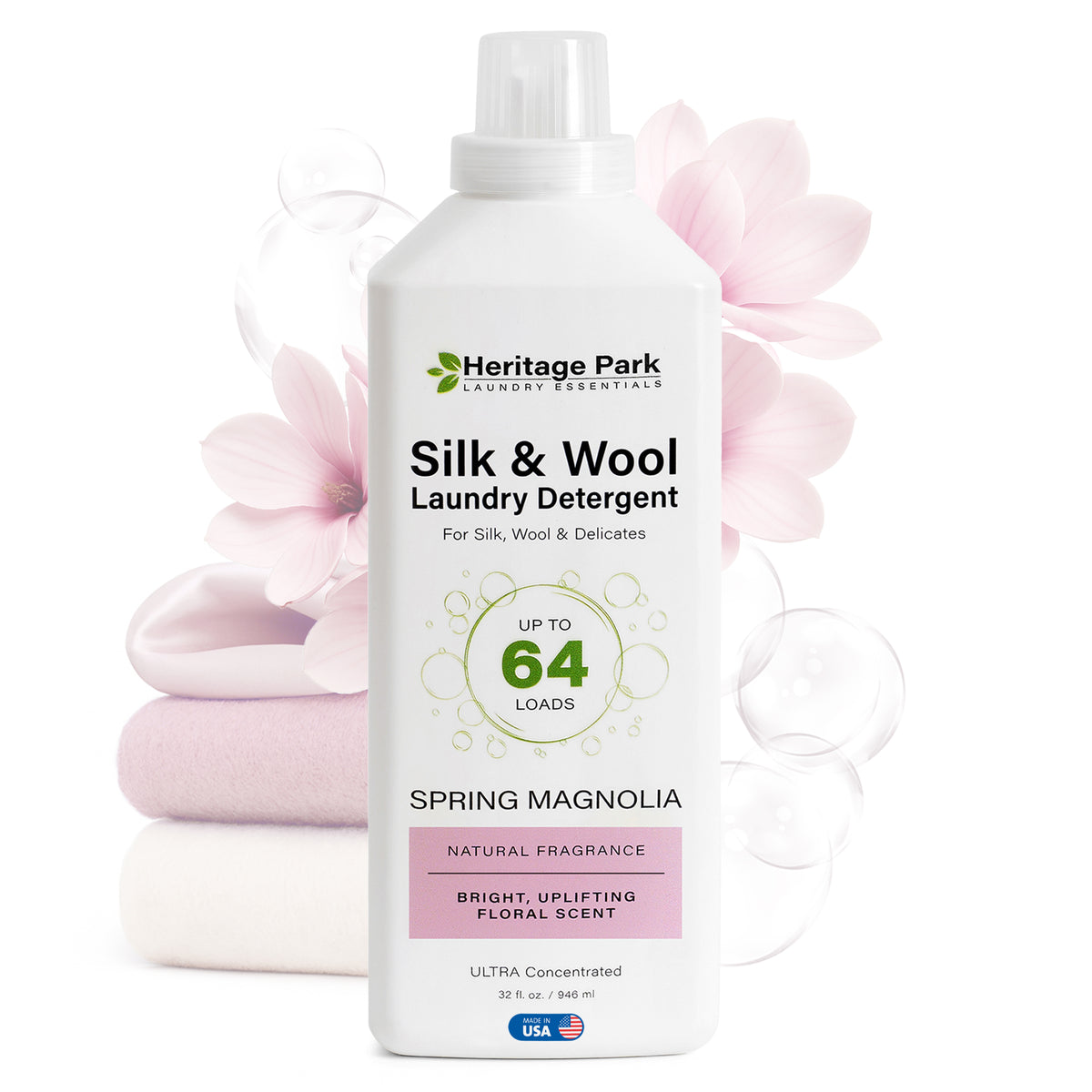 32oz bottle of Spring Magnolia scent Heritage Park Luxury for Silk and Wool Laundry Detergent with flowers in background