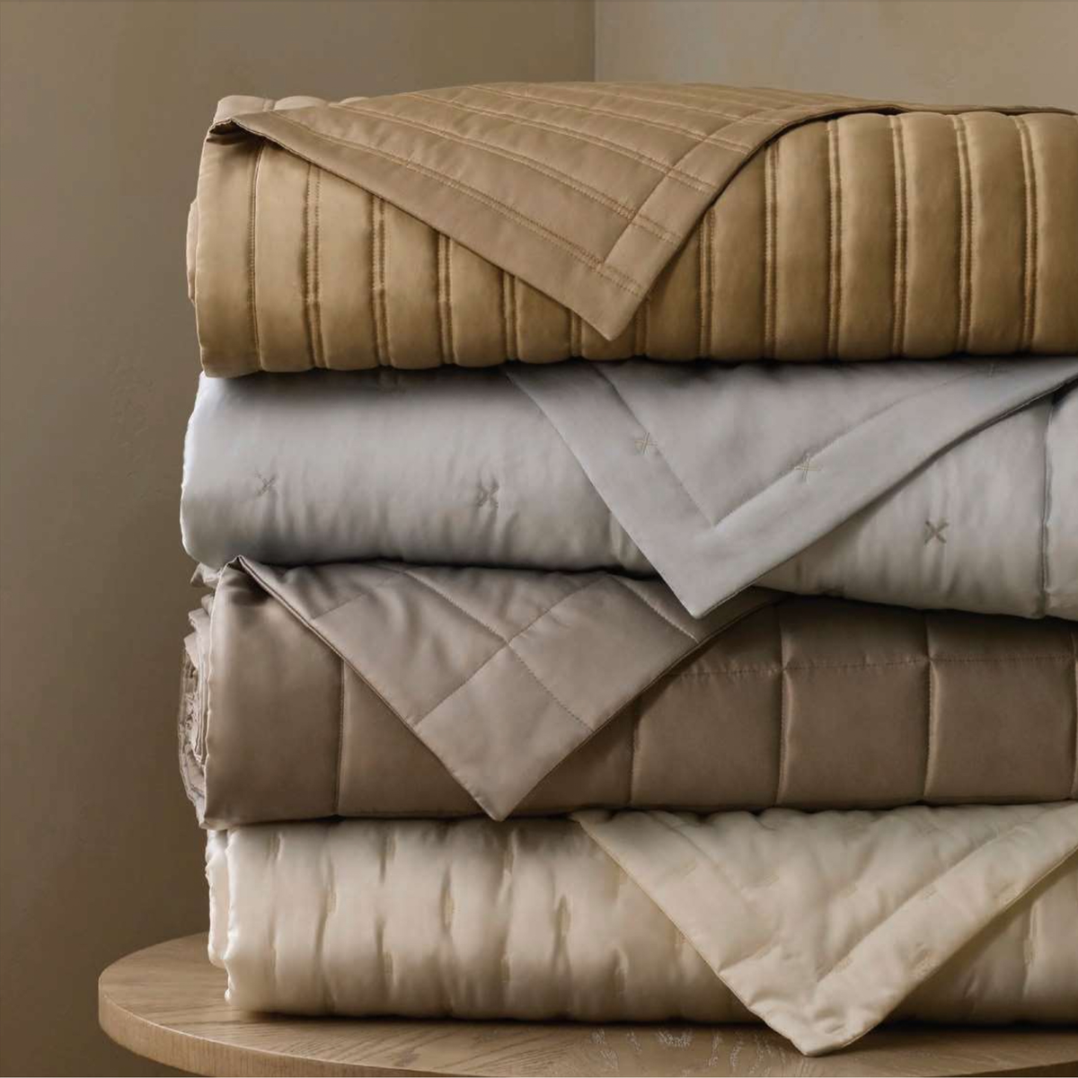 Stack of Home Treasures Mulberry Throws in All Colors