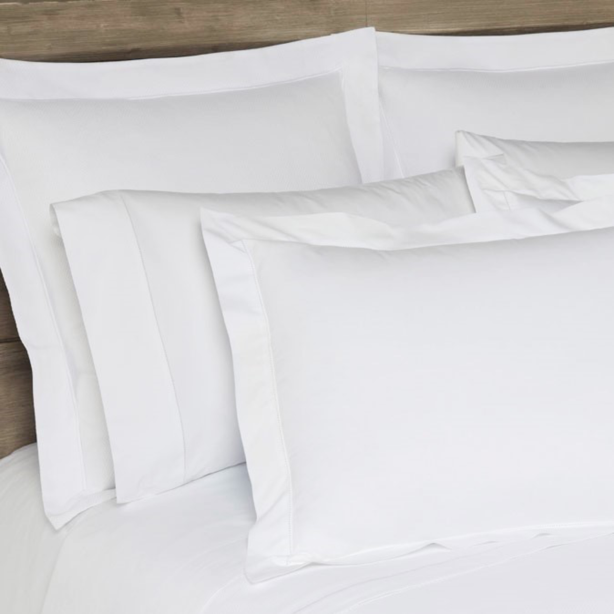 Closeup of Shams of Home Treasures Polycotton Bedding Collection in White Color
