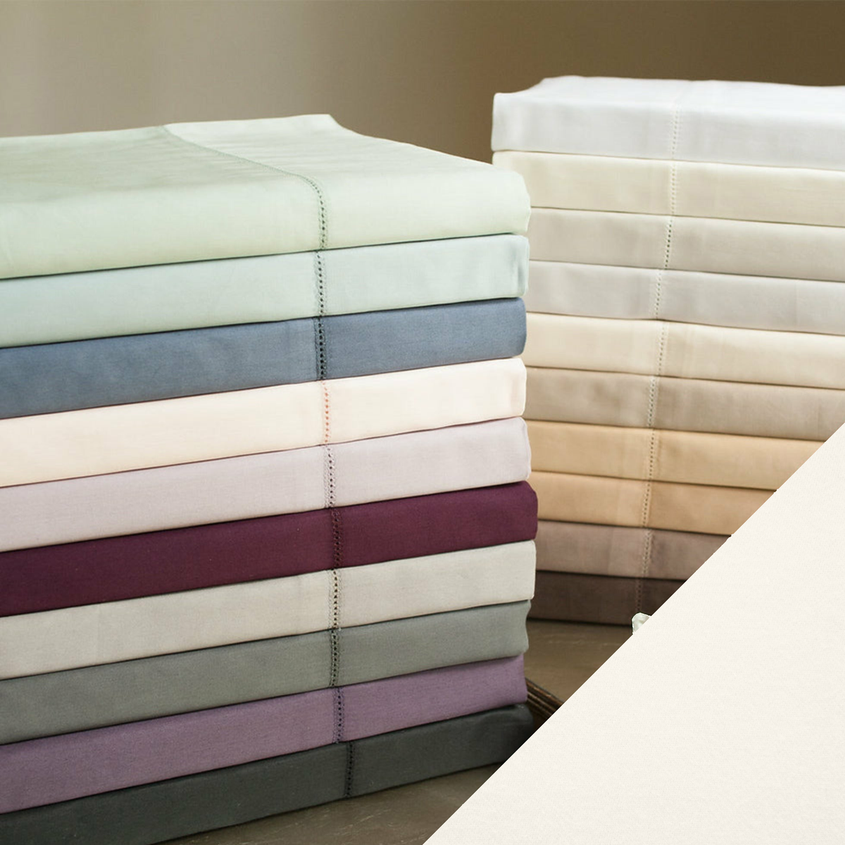 Stack of Home Treasures Royal Sateen Bedding with Eggshell Color Swatch