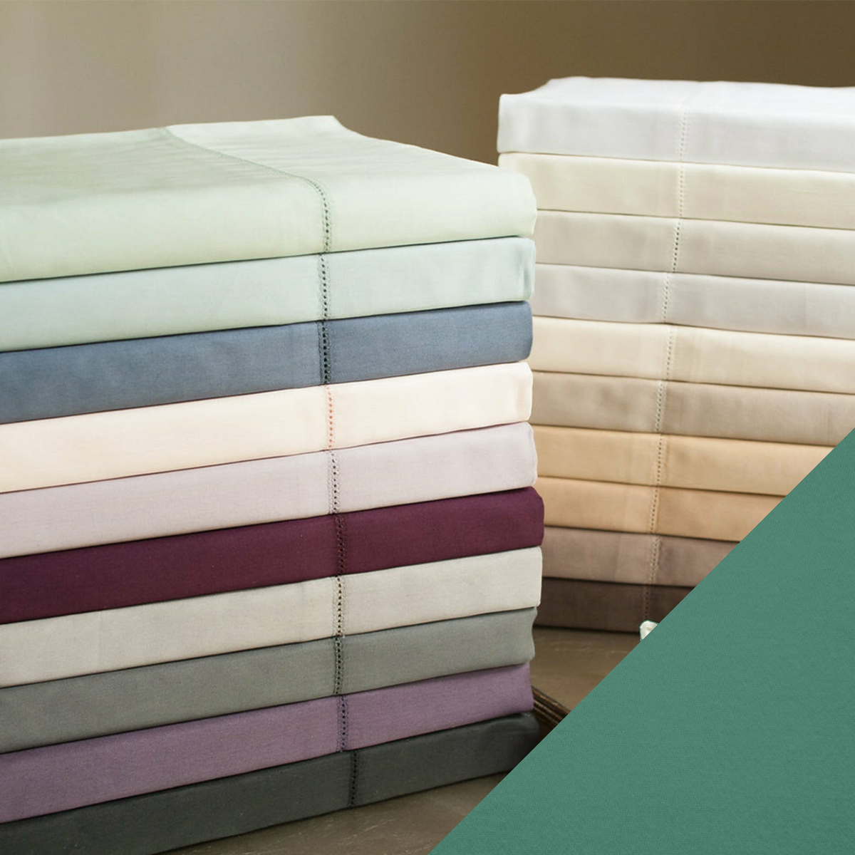Stack of Home Treasures Royal Sateen Bedding with Emerald Color Swatch