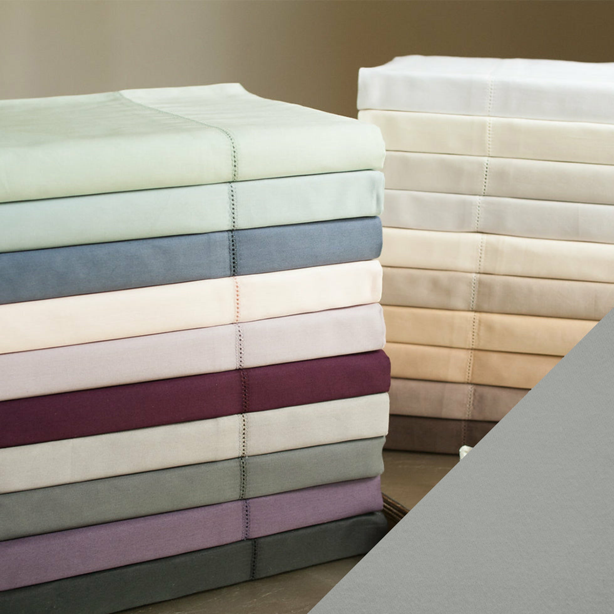 Stack of Home Treasures Royal Sateen Bedding with Storm Color Swatch