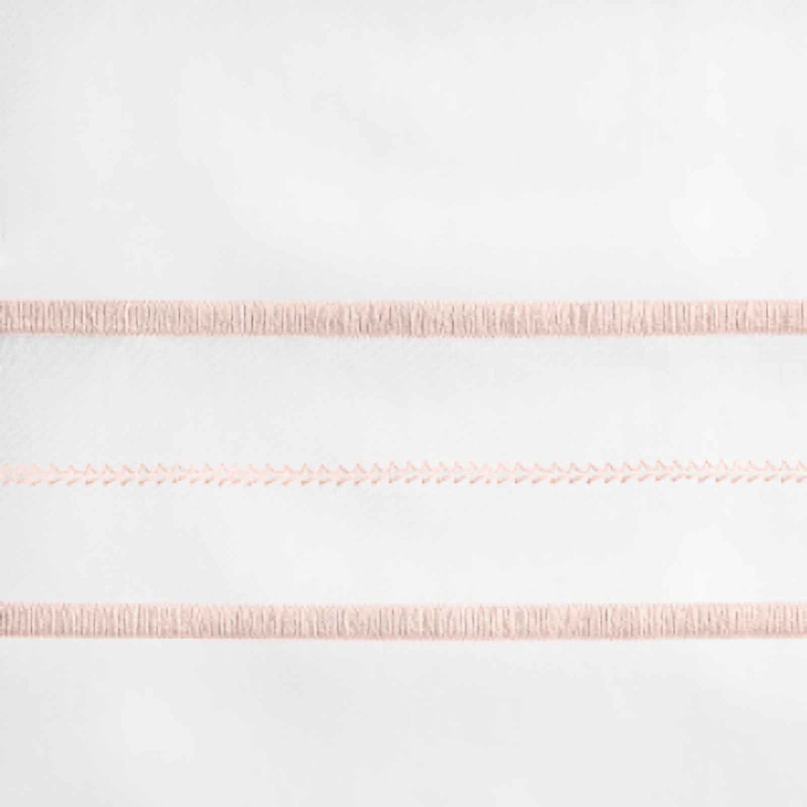 Lifestyle Image of Home Treasures Triad Bedding with White/Light Pink Swatch