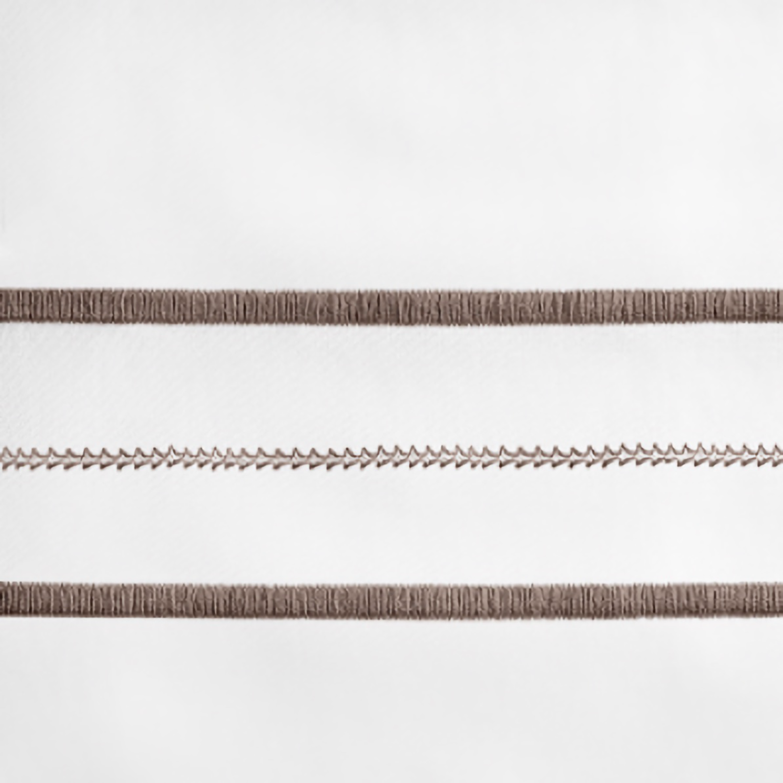 Lifestyle Image of Home Treasures Triad Bedding with White/Ricco Swatch