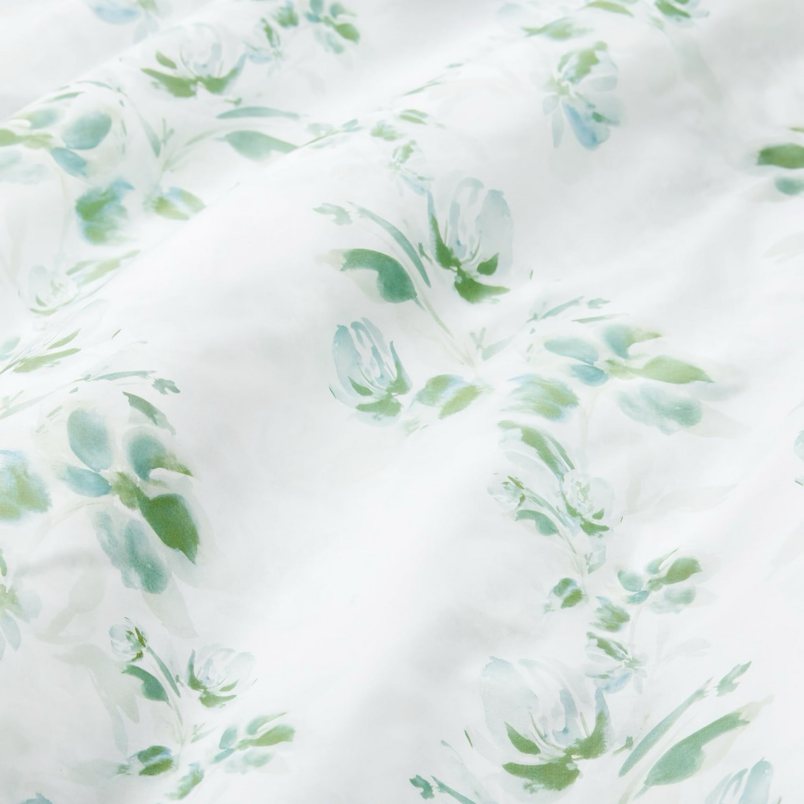 Bed in Poolside color Sferra Rosa Duvet Cover and Shams