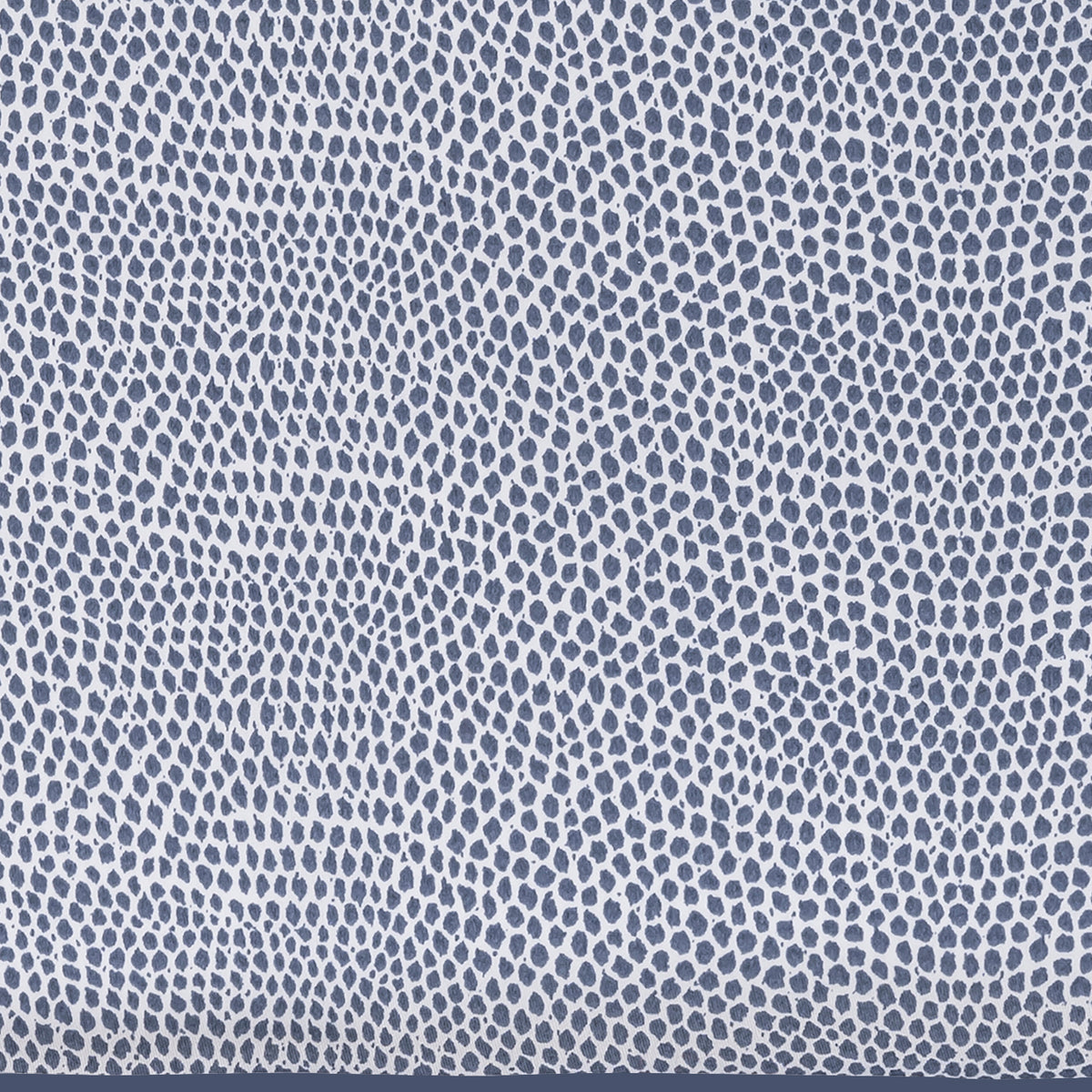 Patterned fabric with small blue dots on a gray background
