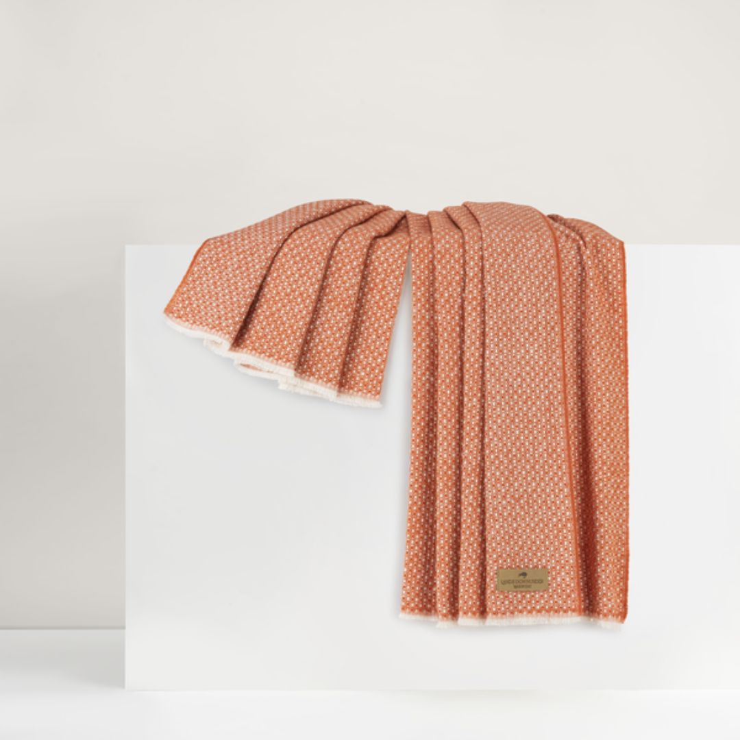 Lands Downunder Hudson Valley Throw in Mandarin color