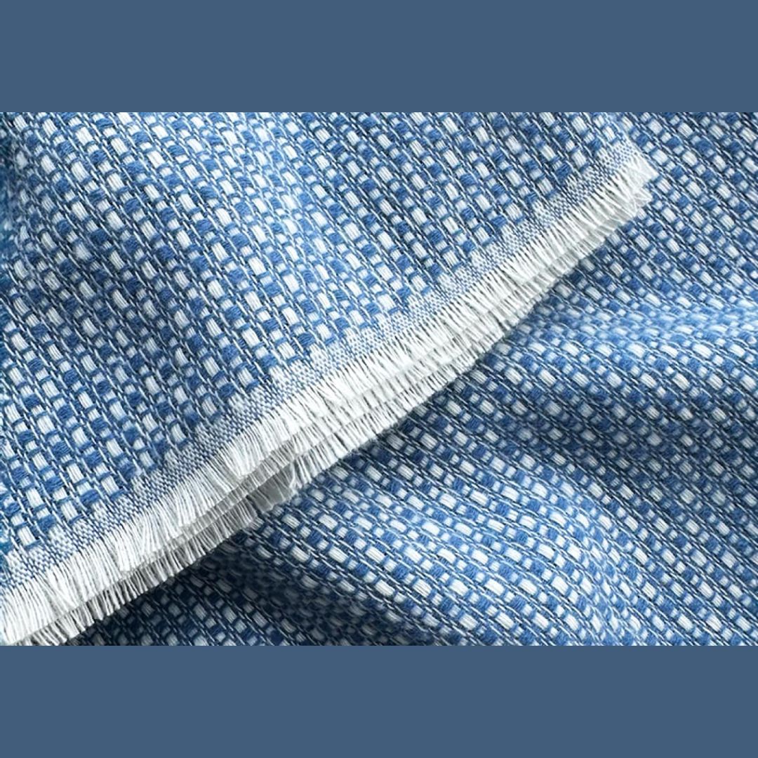 Close-up of Lands Downunder Hudson Valley Throw fabric with eyelash fringe edge