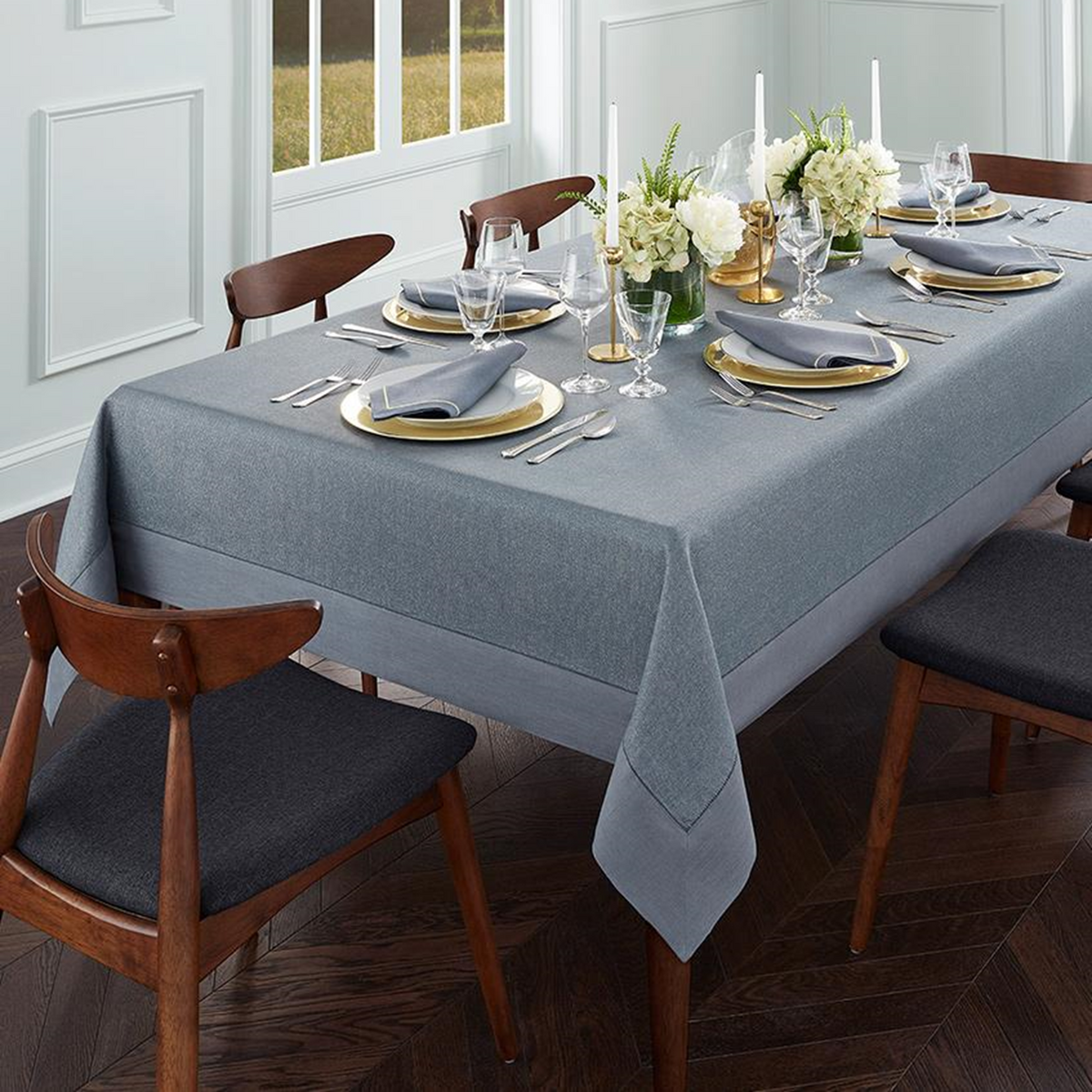 Lifestyle Image of Sferra Reece Table Linens in Flint/Gold Color