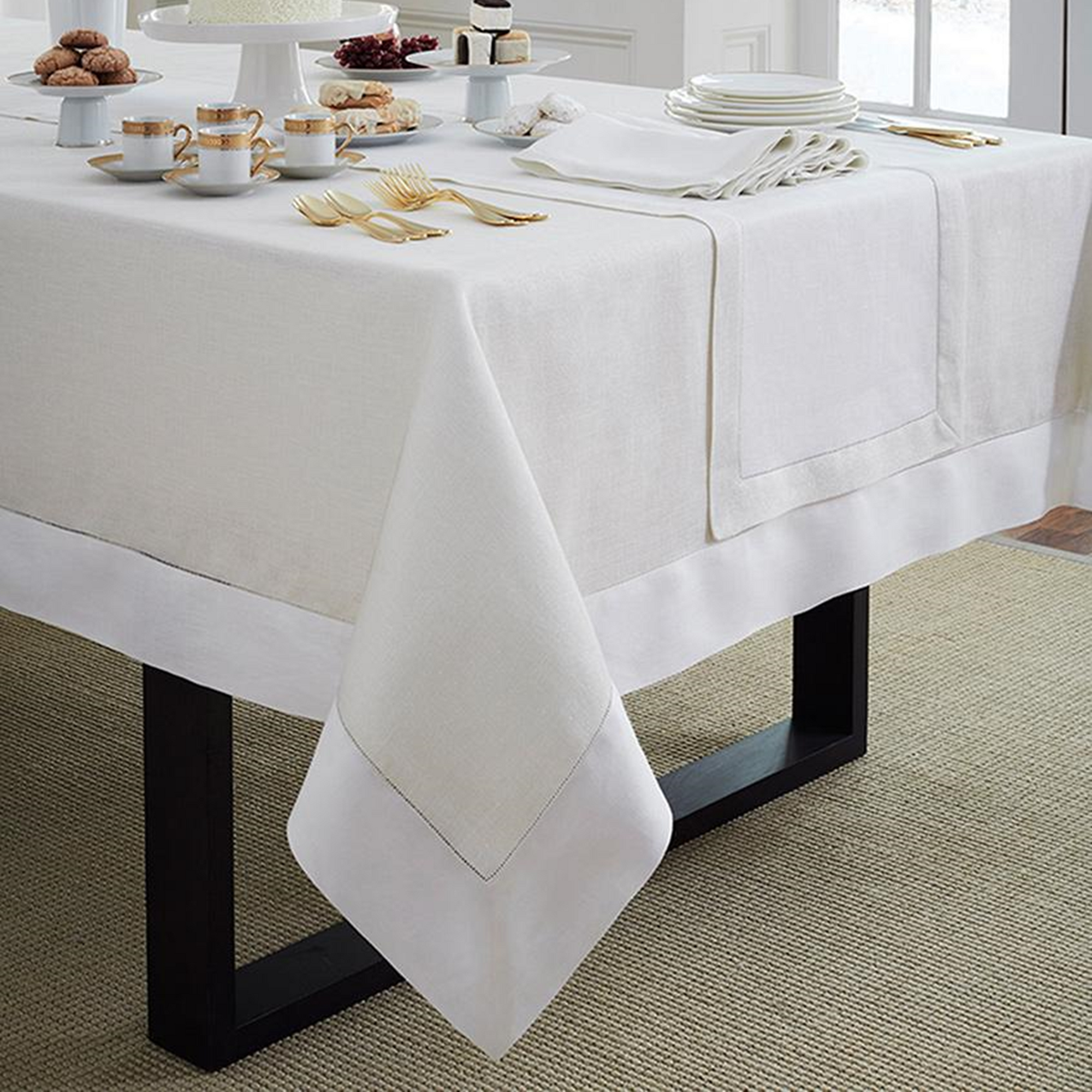 Lifestyle Image of Sferra Reece Table Linens in White/Gold Color