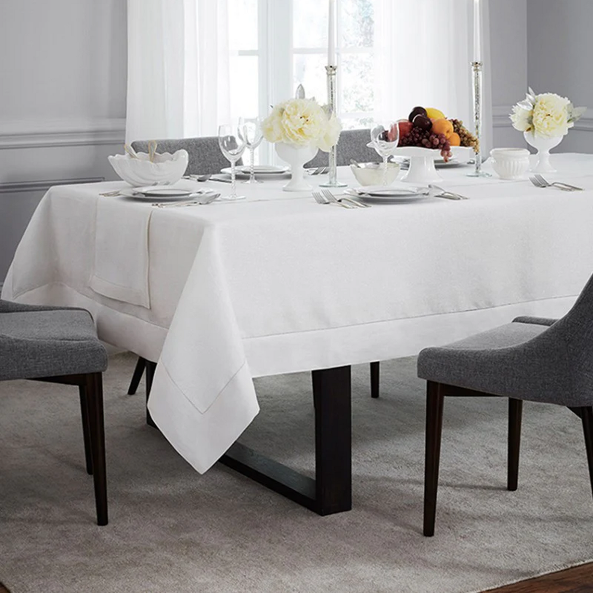 Lifestyle Image of Sferra Reece Table Linens in Silver/White Color