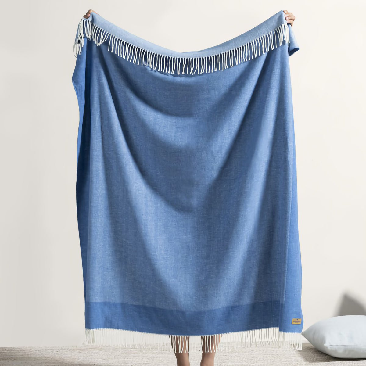 Hanging Lands Downunder Border Herringbone Throw in Azure color