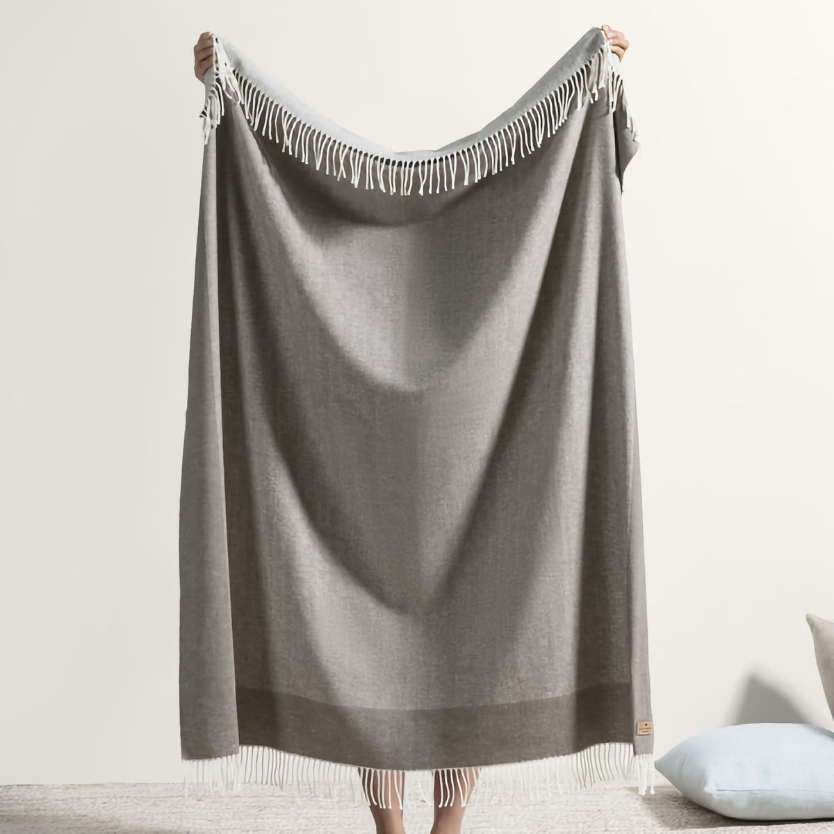 Hanging Lands Downunder Border Herringbone Throw in Mink color