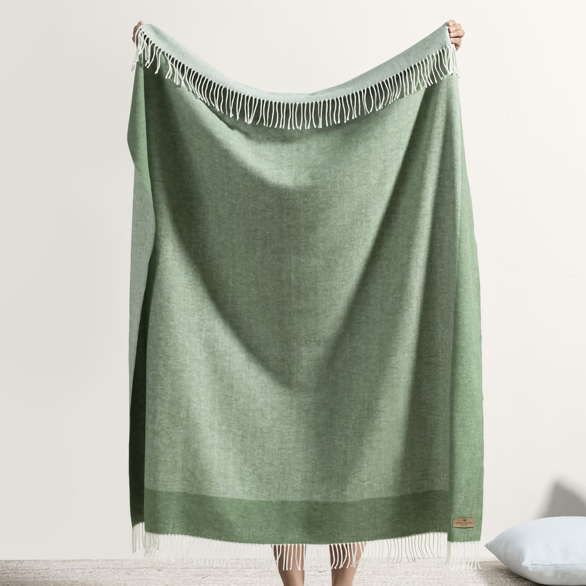 Hanging Lands Downunder Border Herringbone Throw in Olive color