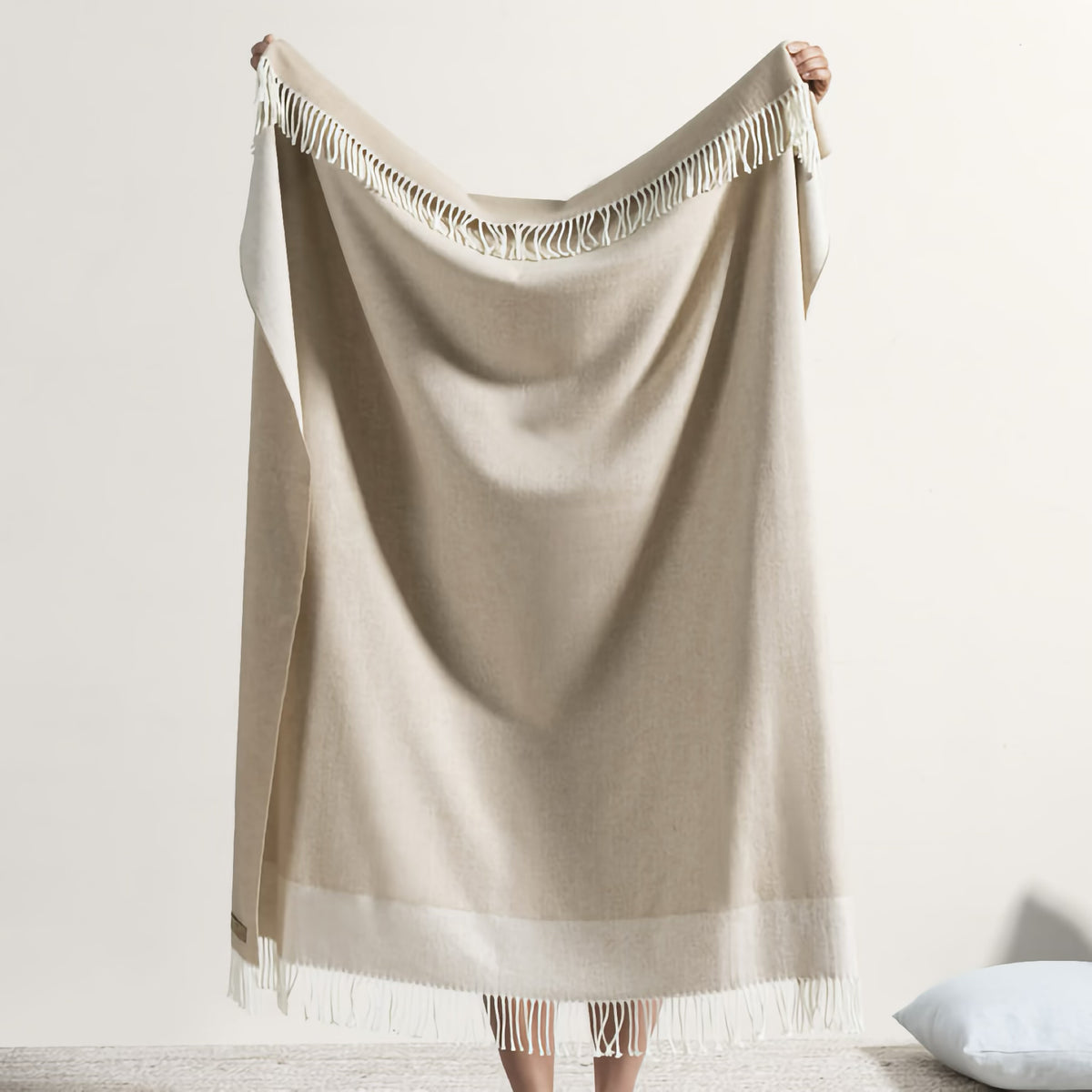 Reverse side of Lands Downunder Border Herringbone Throw in Dune color