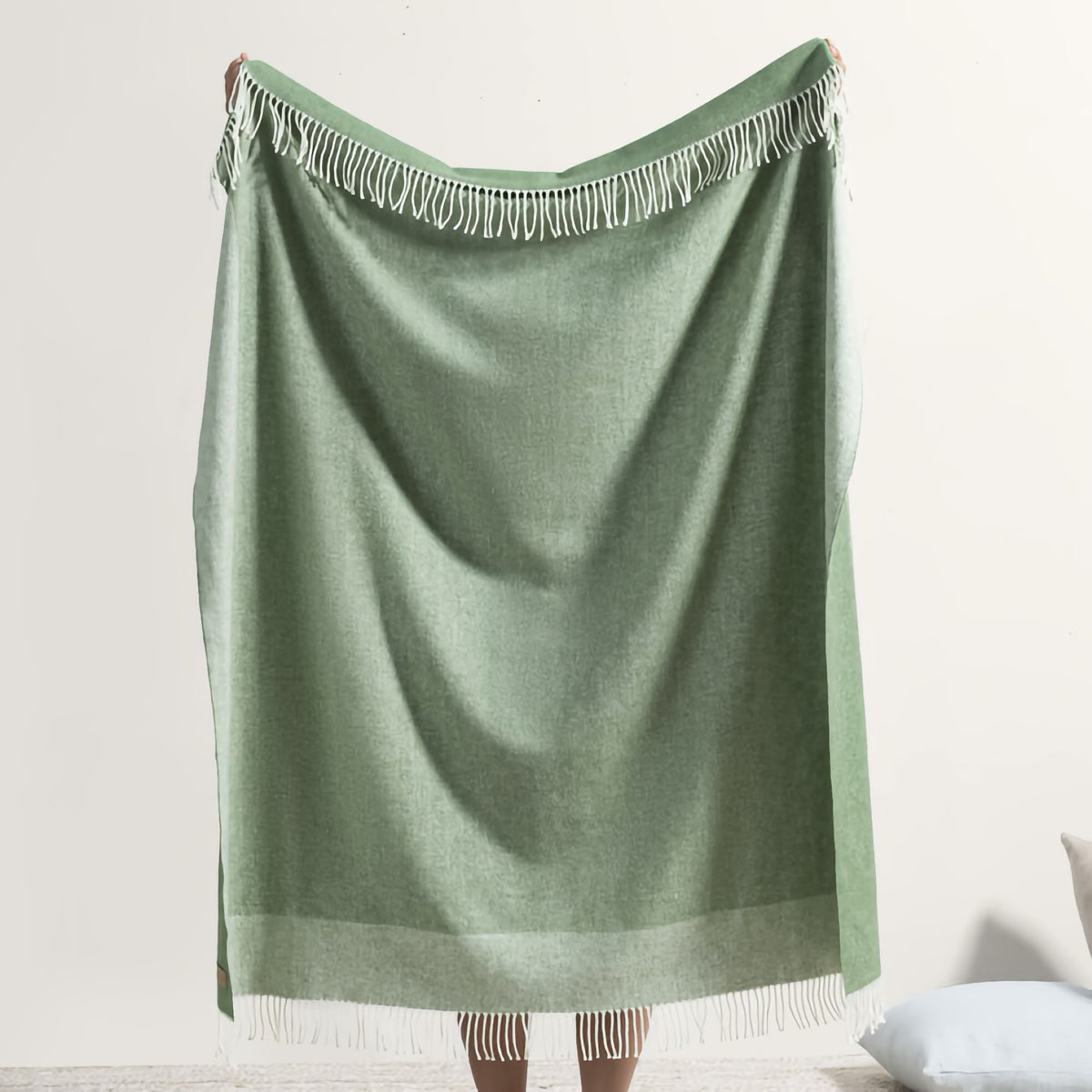 Reverse side of Lands Downunder Border Herringbone Throw in Olive color