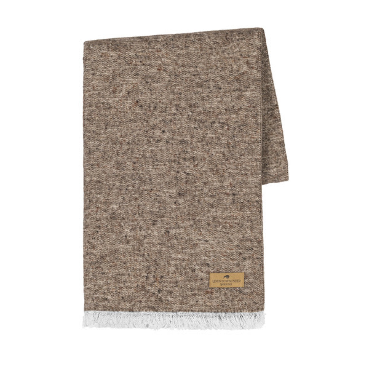 A folded Lands Downunder Cinder Mist Throw in Mocha color with a speckled pattern and white fringed ends