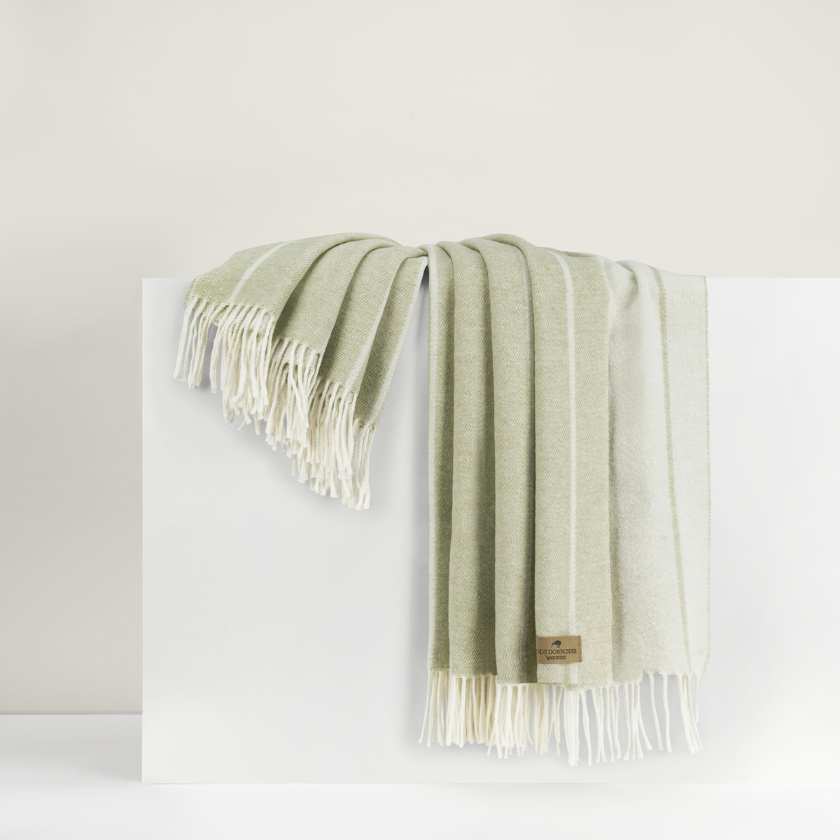 Draped Lands Downunder Fiji Stripe Throw in Sage Color