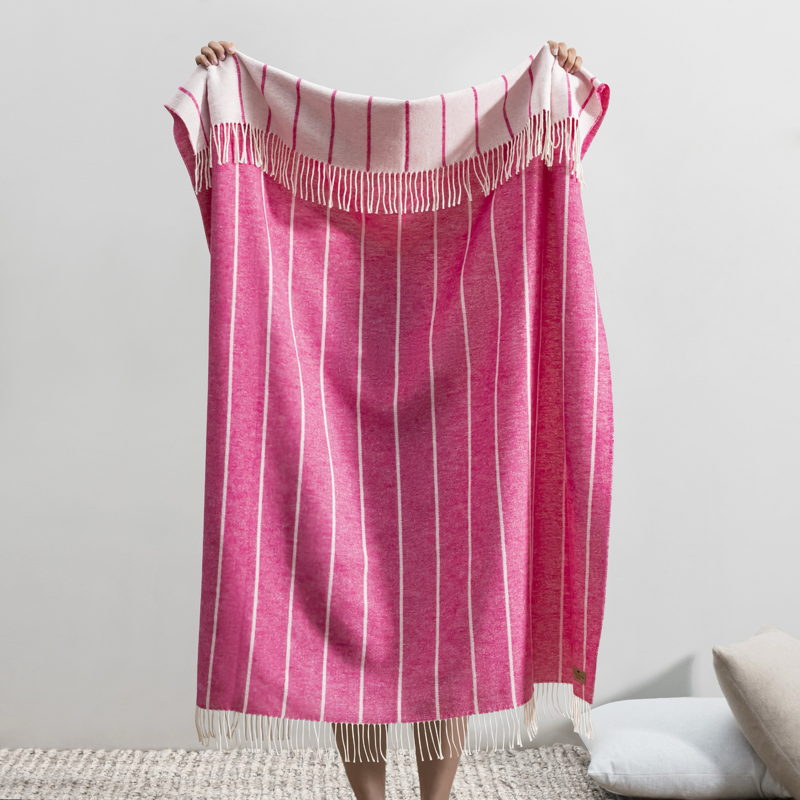 Folded Lands Downunder Fiji Stripe Throw in Wild Orchid Color