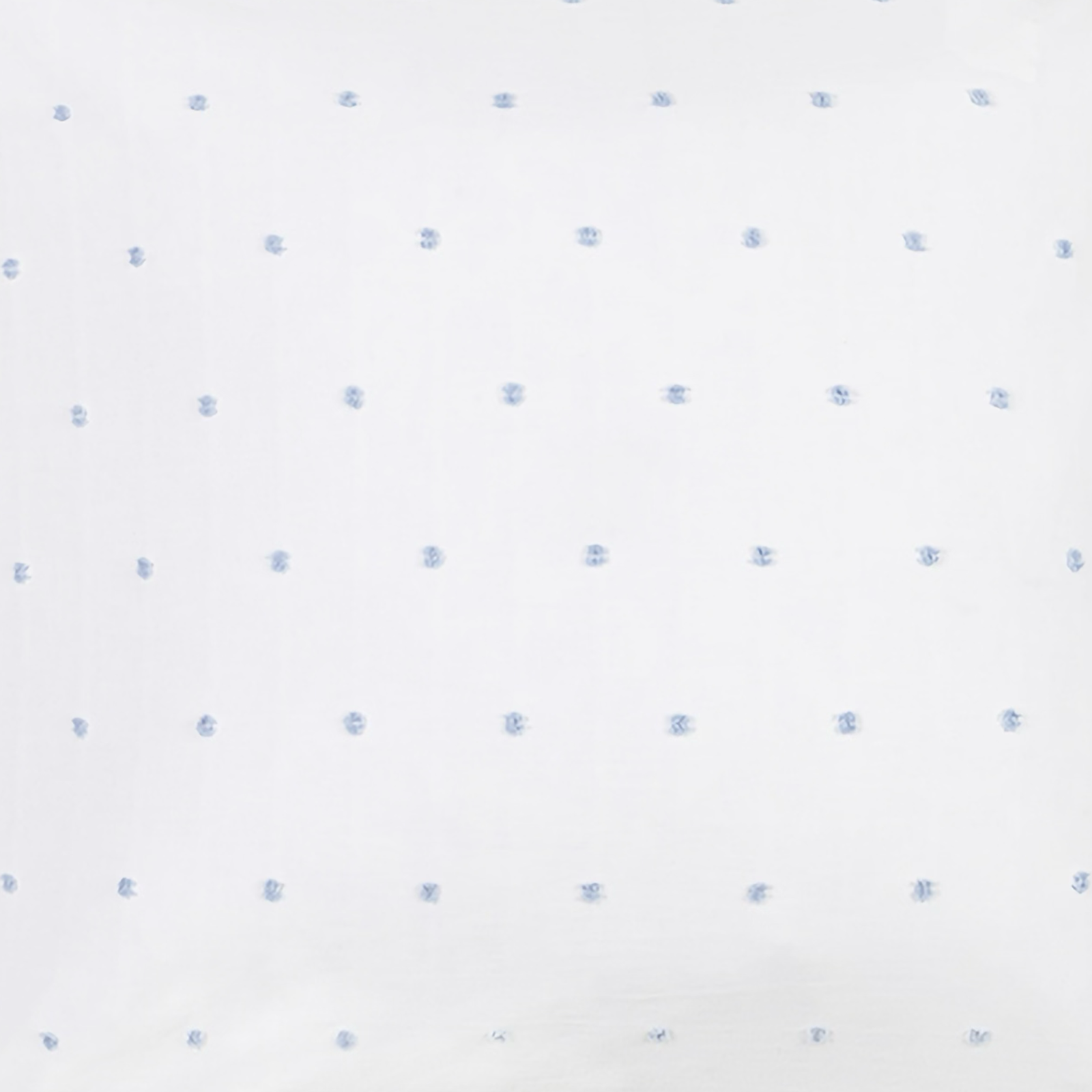 Lifestyle Image of Lands Downunder Island Cotton Coverlet and Shams in Sky Color with Coordinates