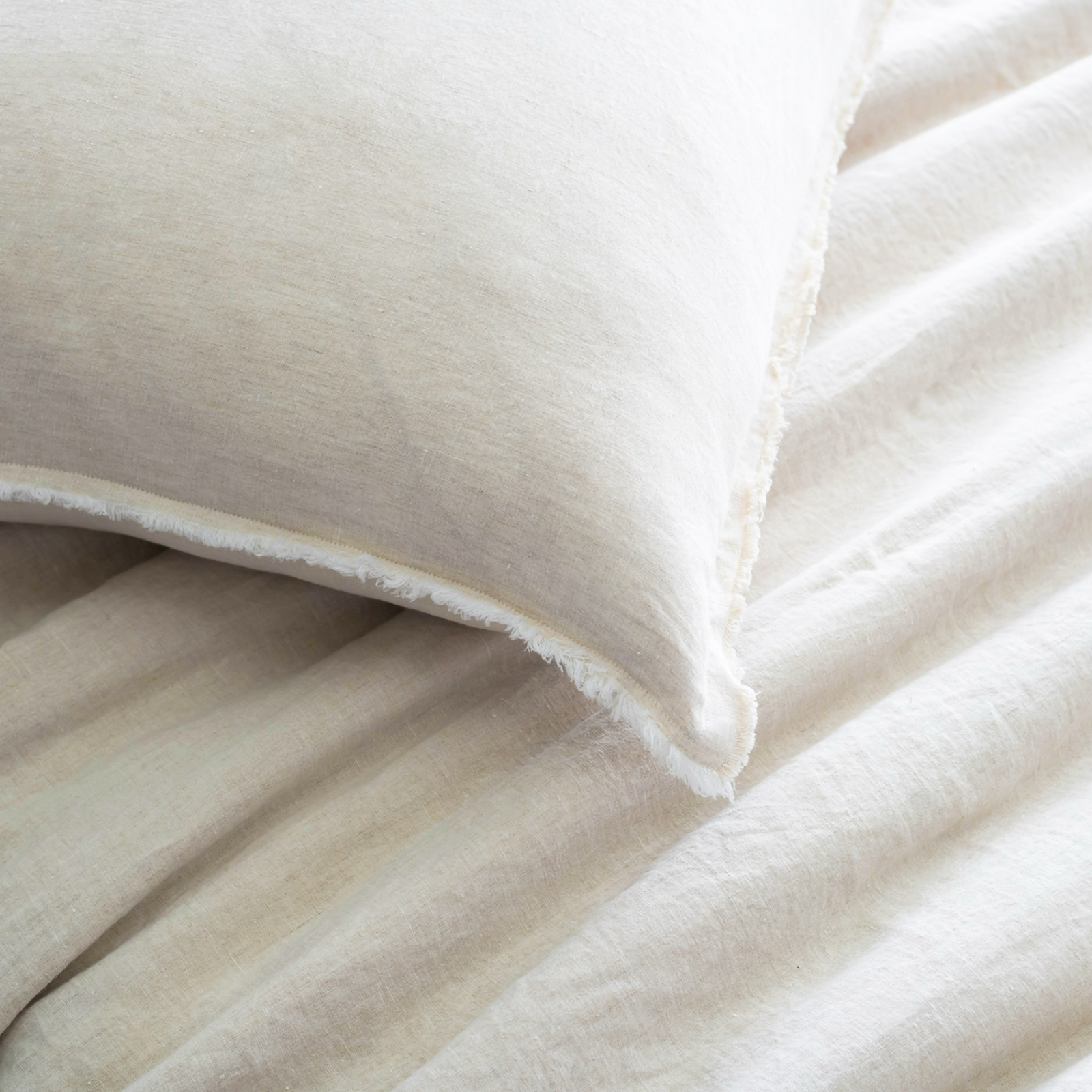 Lifestyle Shot of Lands Downunder Linen Duvet Covers and Shams in Natural Color
