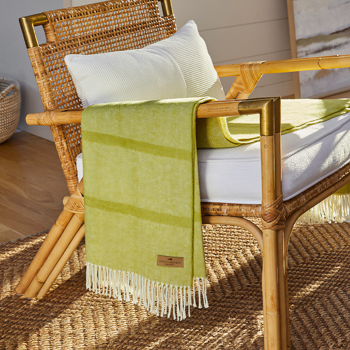 Lifestyle Shot of Lands Downunder Montauk Stripe Herringbone Throws in Lemongrass Color