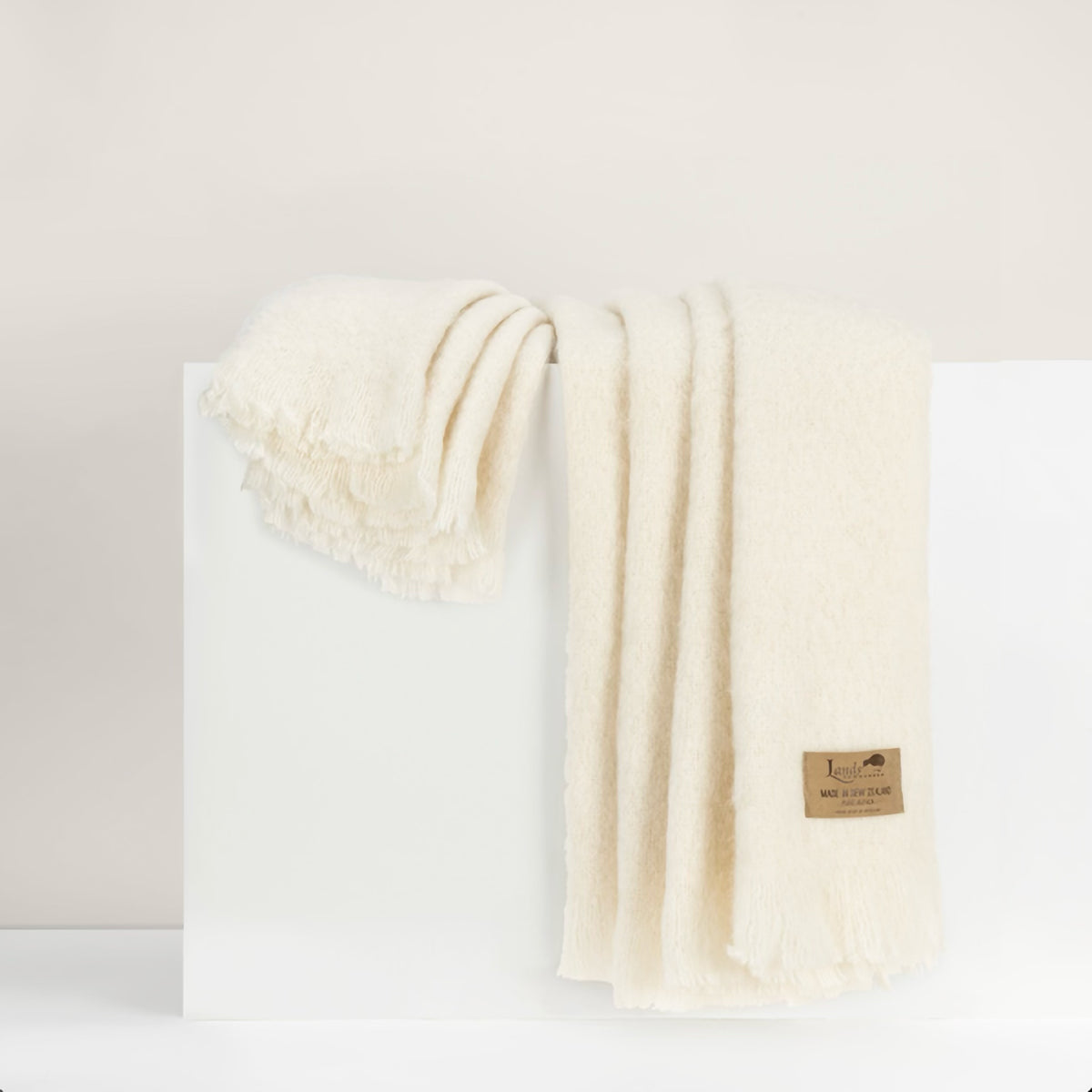 Lands Downunder New Zealand Alpaca Throw in Cream color