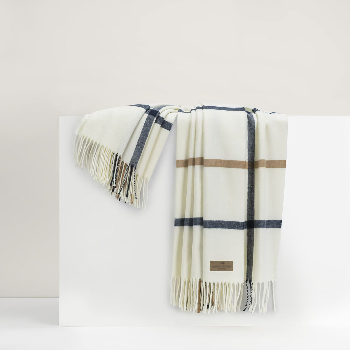 Lands Downunder Tattersall Plaid Throw in Navy and Caramel color