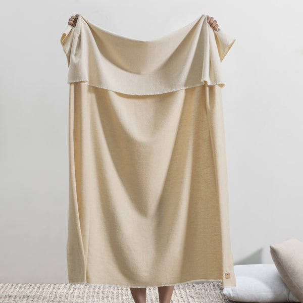 Lands Downunder Aspen Throw - Almond - held image