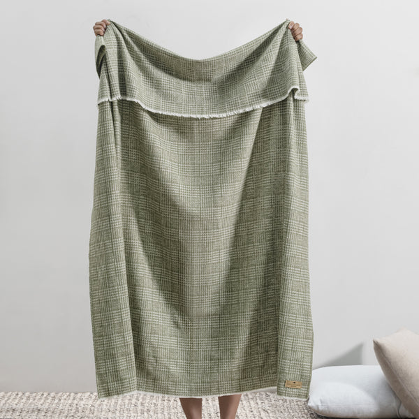 Lands Downunder Sutton Plaid Throw - Chive - held image
