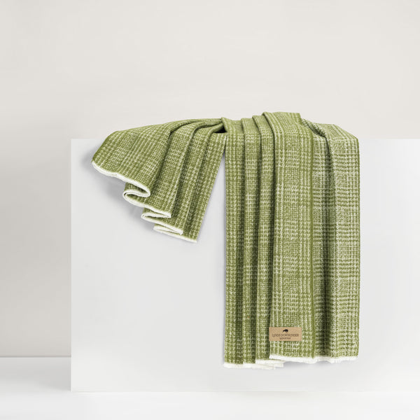 Lands Downunder Sutton Plaid Throw - Fern - draped image