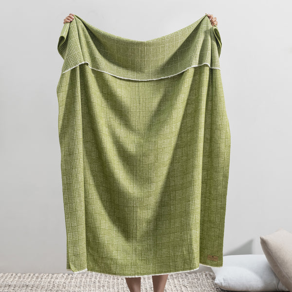 Lands Downunder Sutton Plaid Throw - Fern - held image