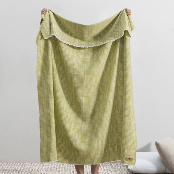 Lands Downunder Sutton Plaid Throw - Lemongrass - draped image