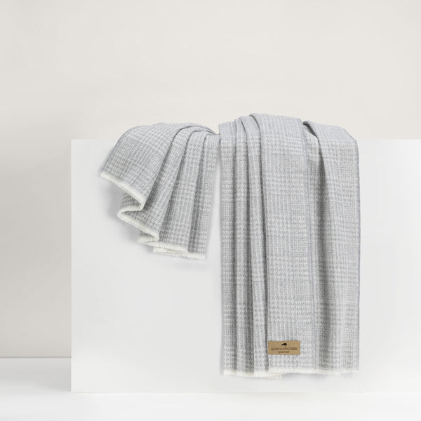 Lands Downunder Sutton Plaid Throw - Light Gray - draped image