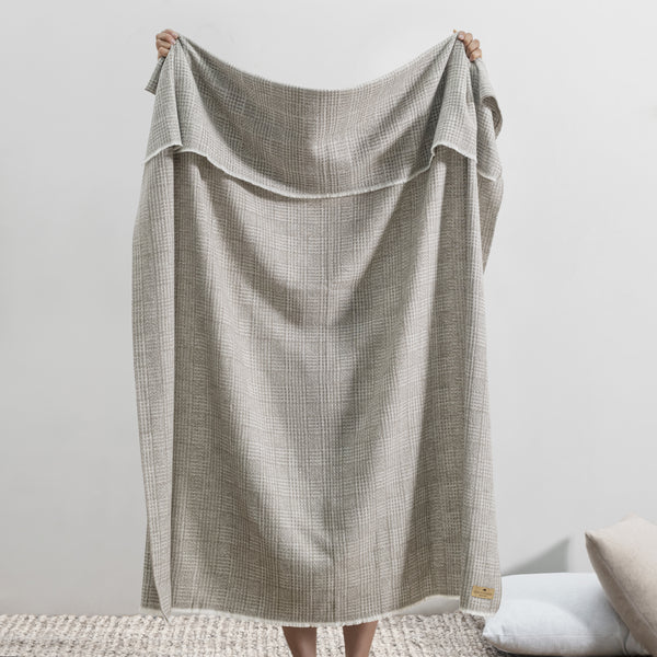 Lands Downunder Sutton Plaid Throw - Mink - held image