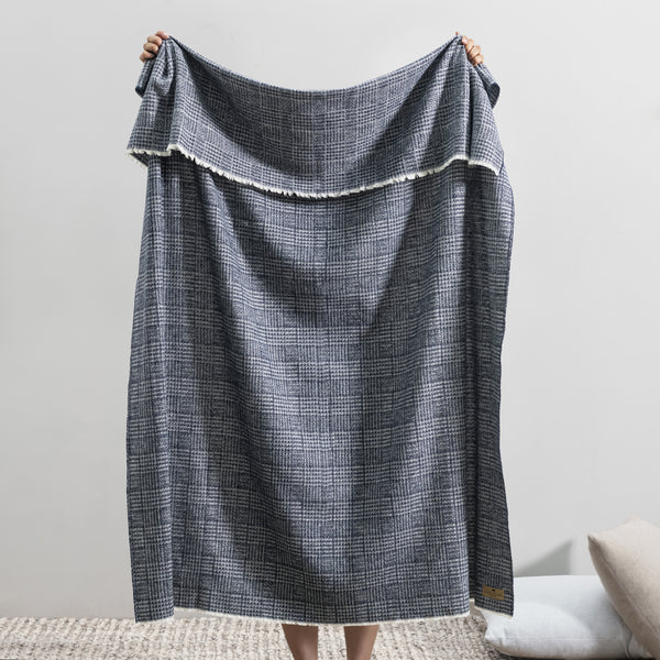 Lands Downunder Sutton Plaid Throw - Navy - draped image