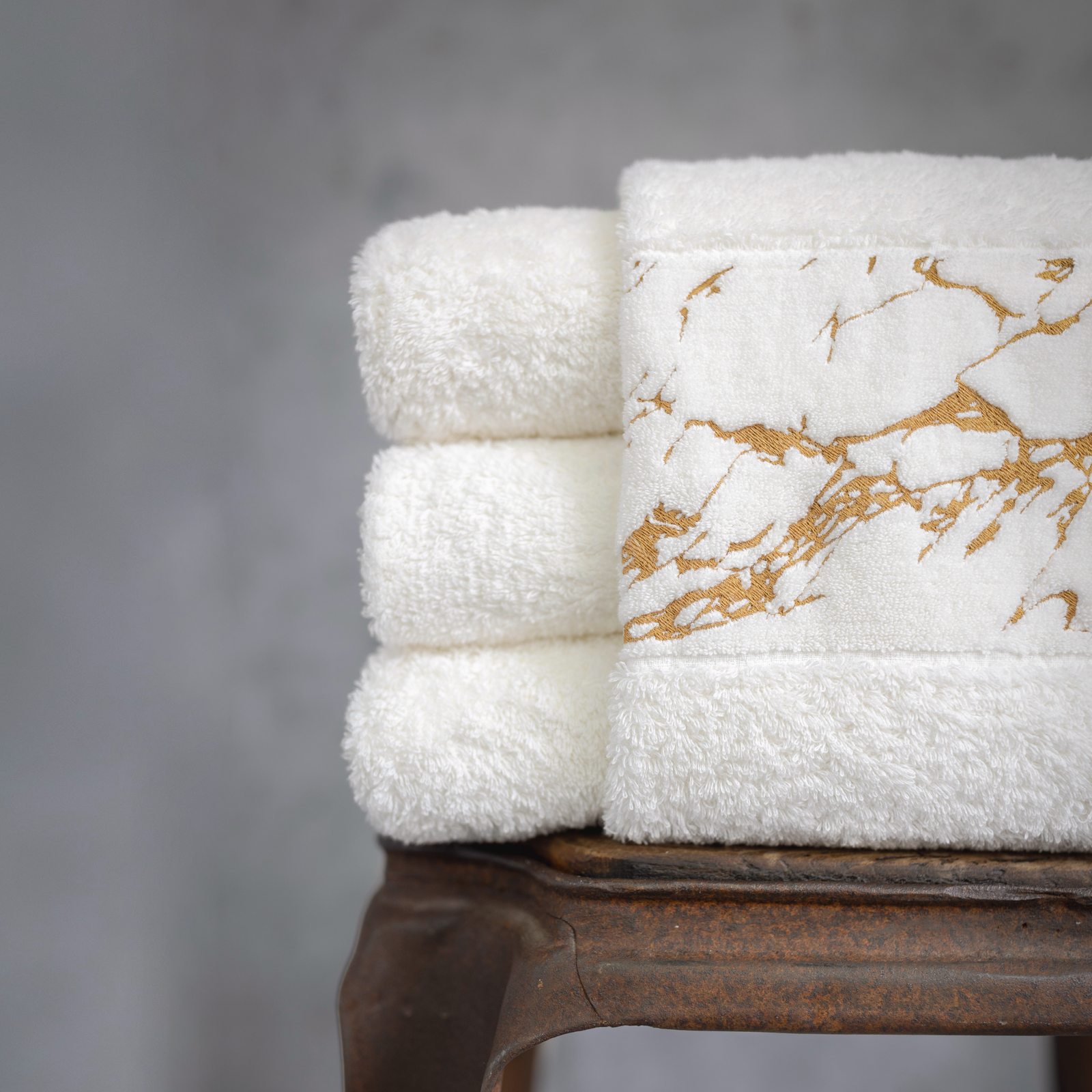 Lifestyle Closeup of Abyss Alpi Hand Towels in Gold Color