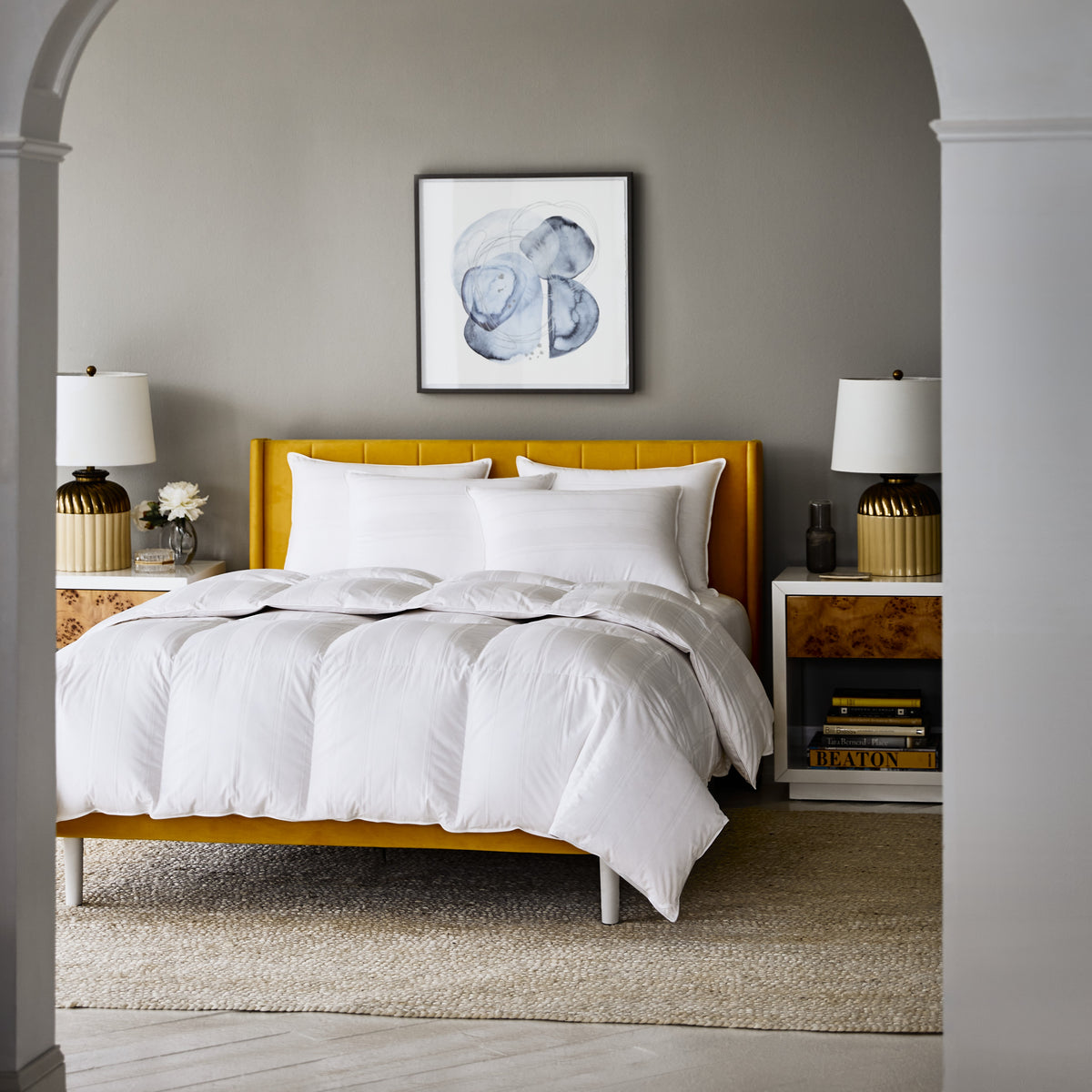 Scandia Home Lucerne Comforter and Pillows displayed on a bed with modern furniture style