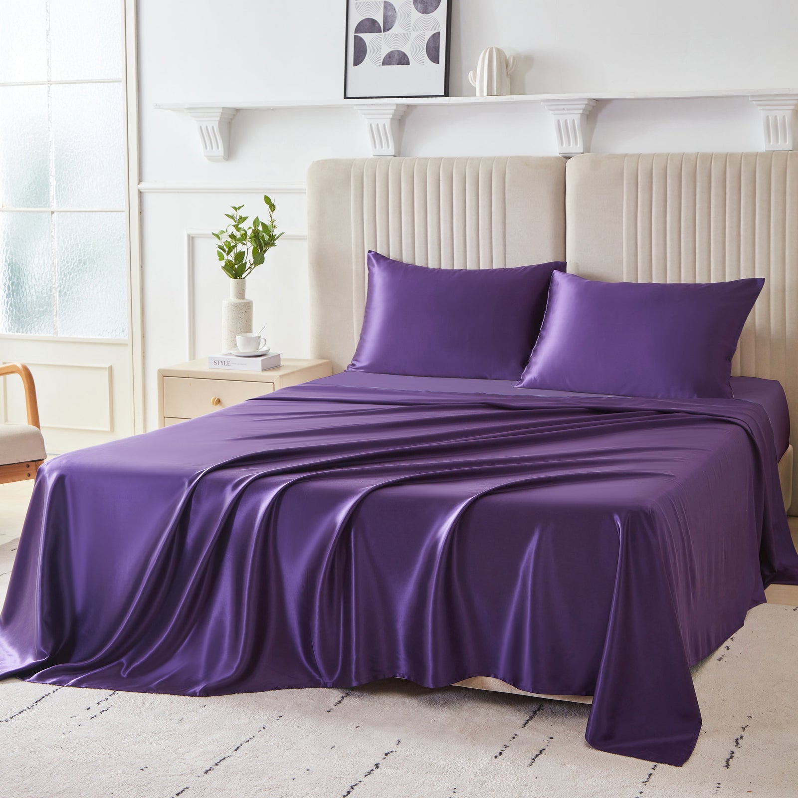 Elegant 22 Momme Silk Sheets Set in Plum color displayed on a beautiful bed with silk pillows