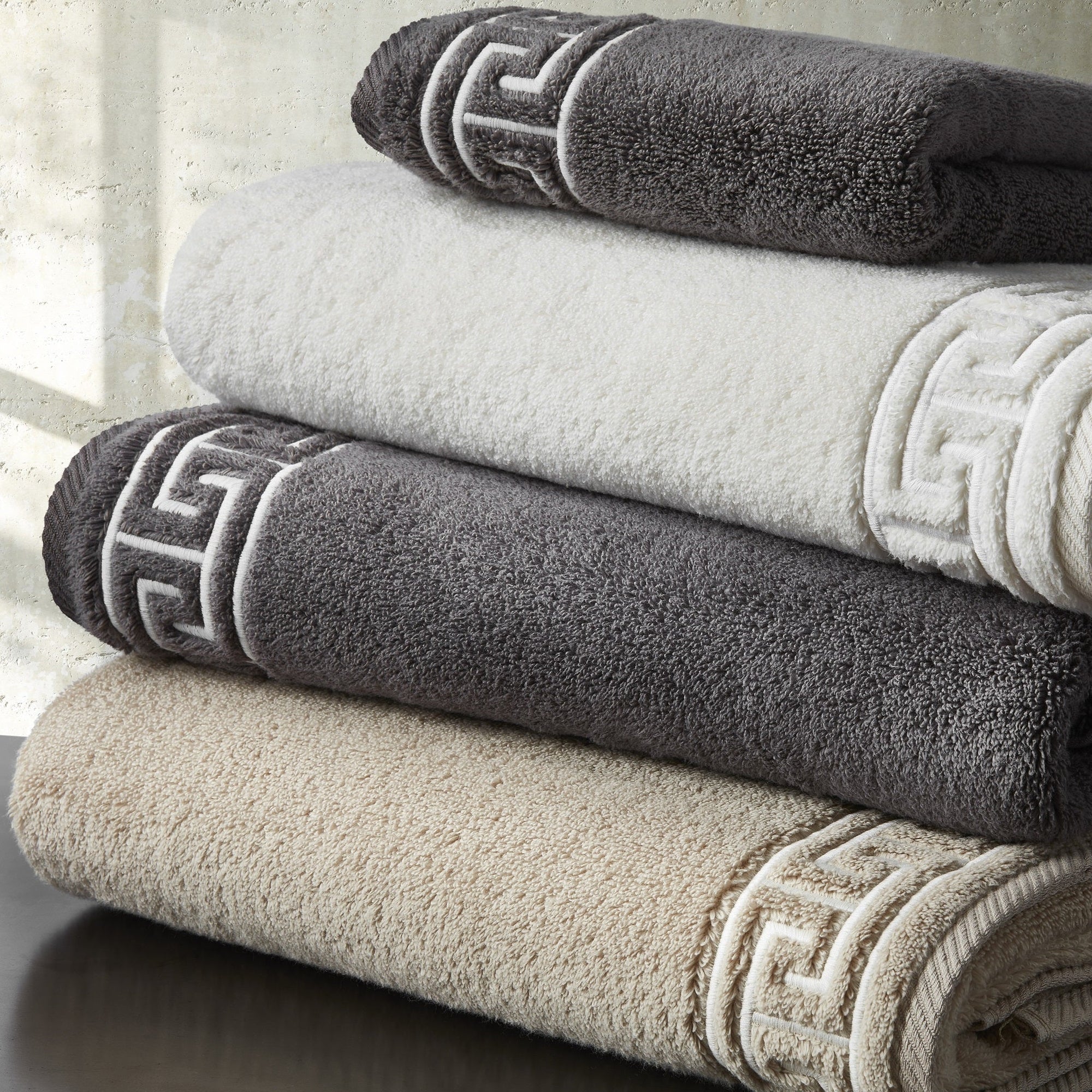 Stack of Matouk Adelphi Bath Towel in All Colors