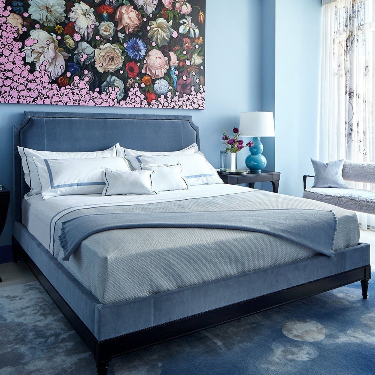 Matouk Agnes Throw in Hazy Blue Color on a Bed