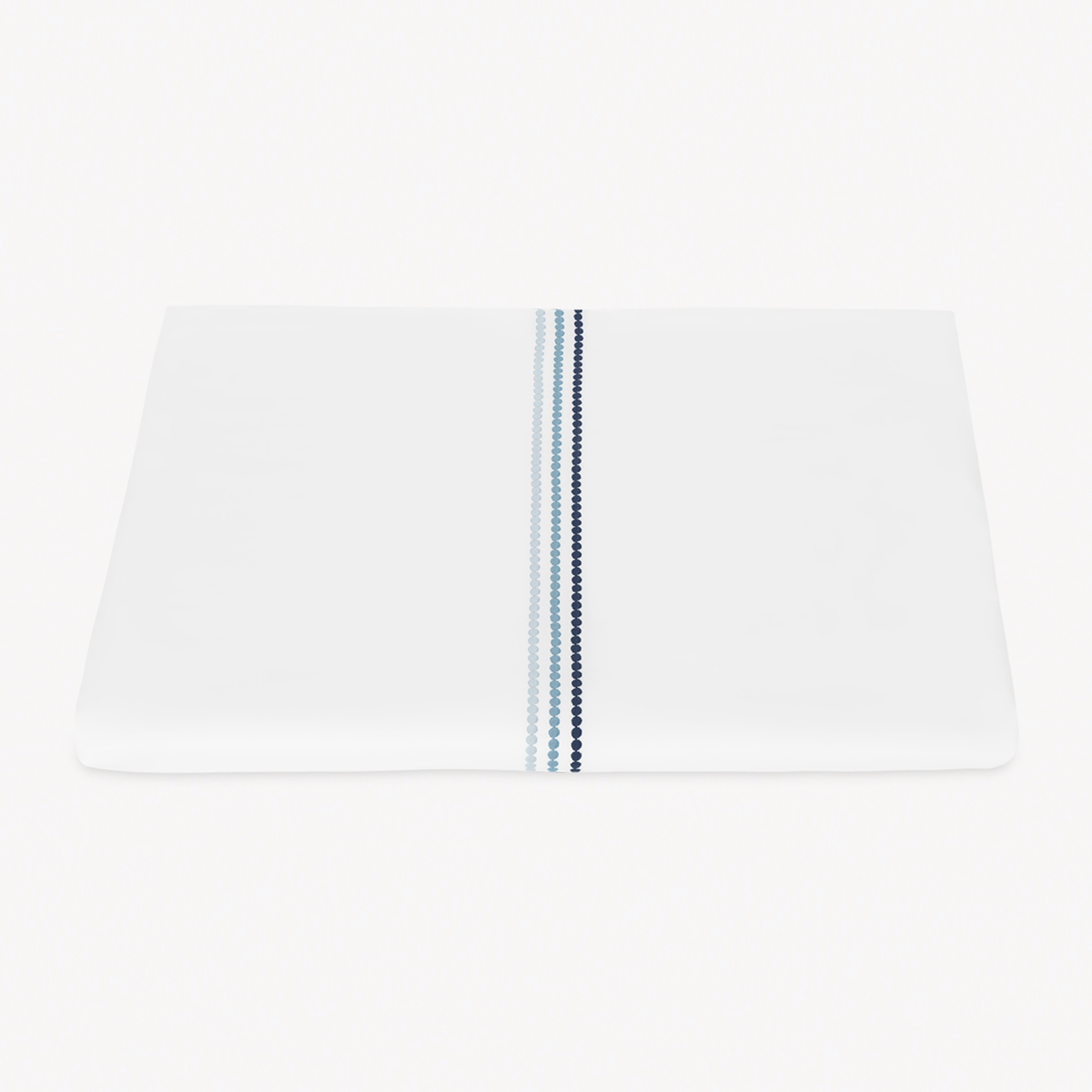 Folded Duvet Cover of Matouk Amara Triple Pearl Bedding in Sailor Blue