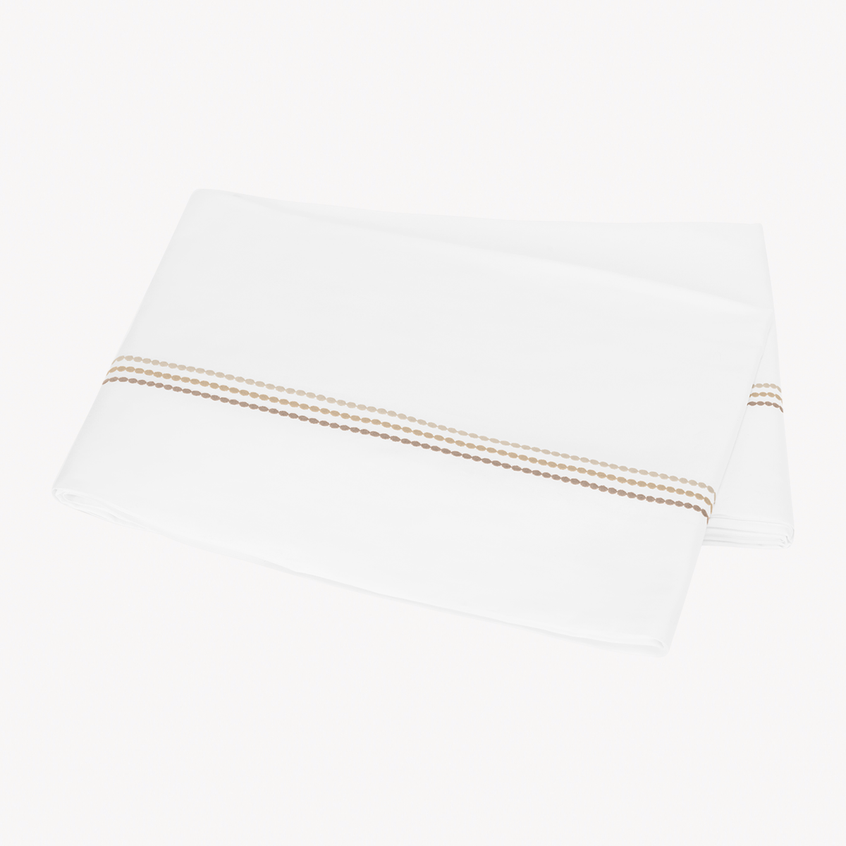 Folded Flat Sheet of Matouk Amara Triple Pearl Bedding in Beach