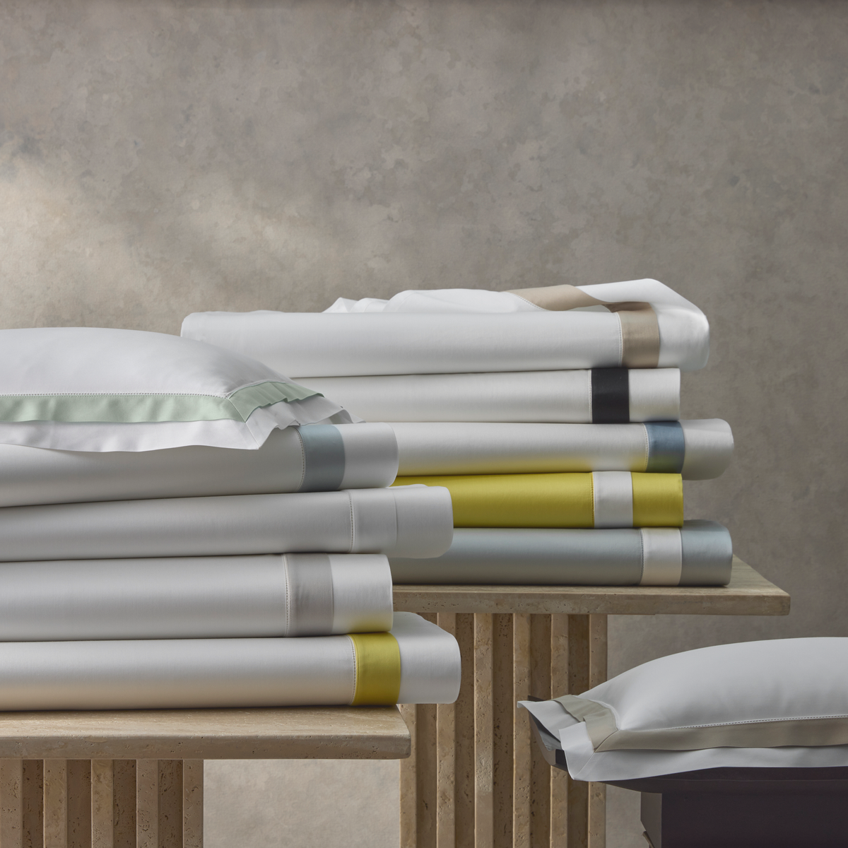 Folded Bed Sheets of Matouk Ambrose Bedding in All Colors
