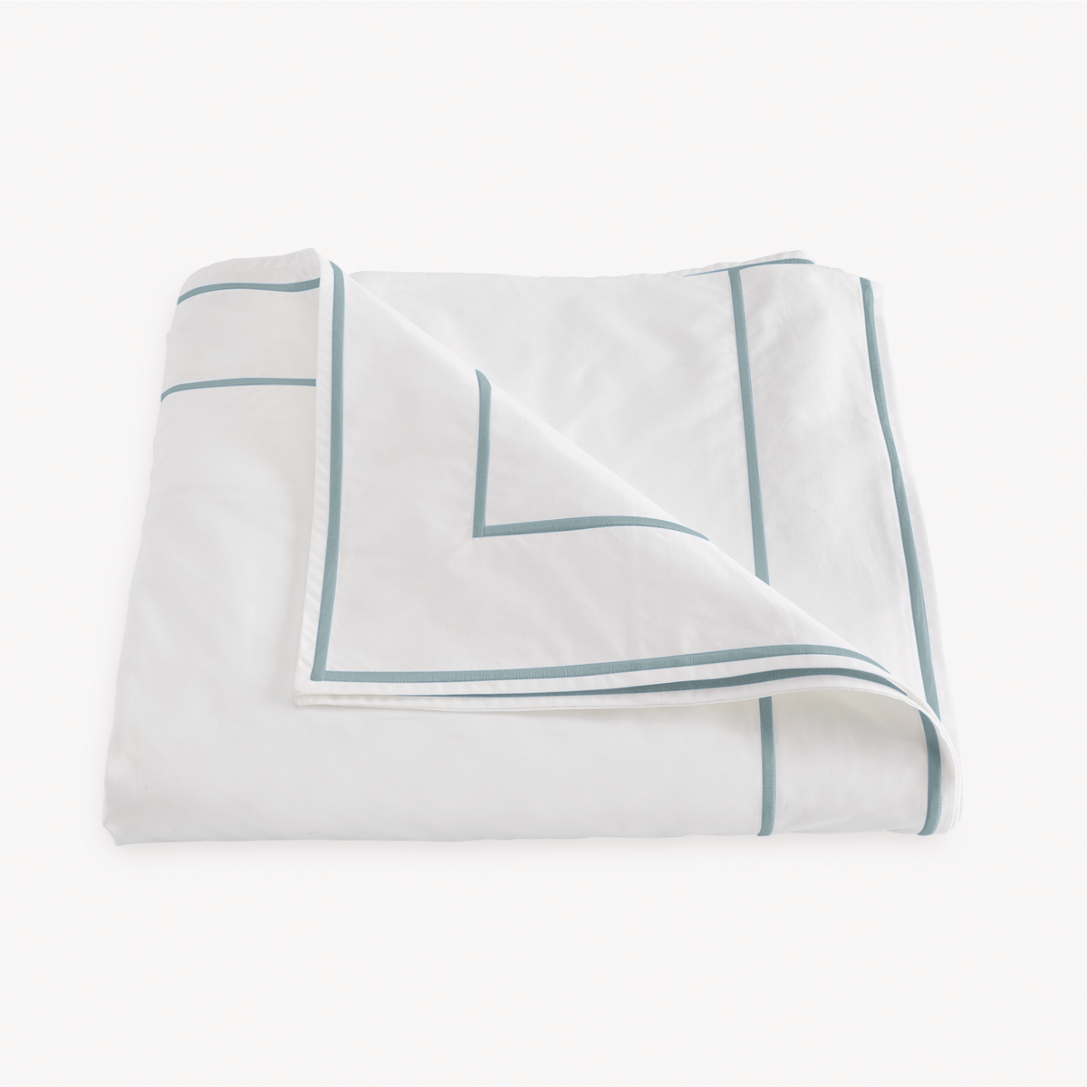 Folded Duvet Cover of Matouk Ansonia Bedding in Pool color