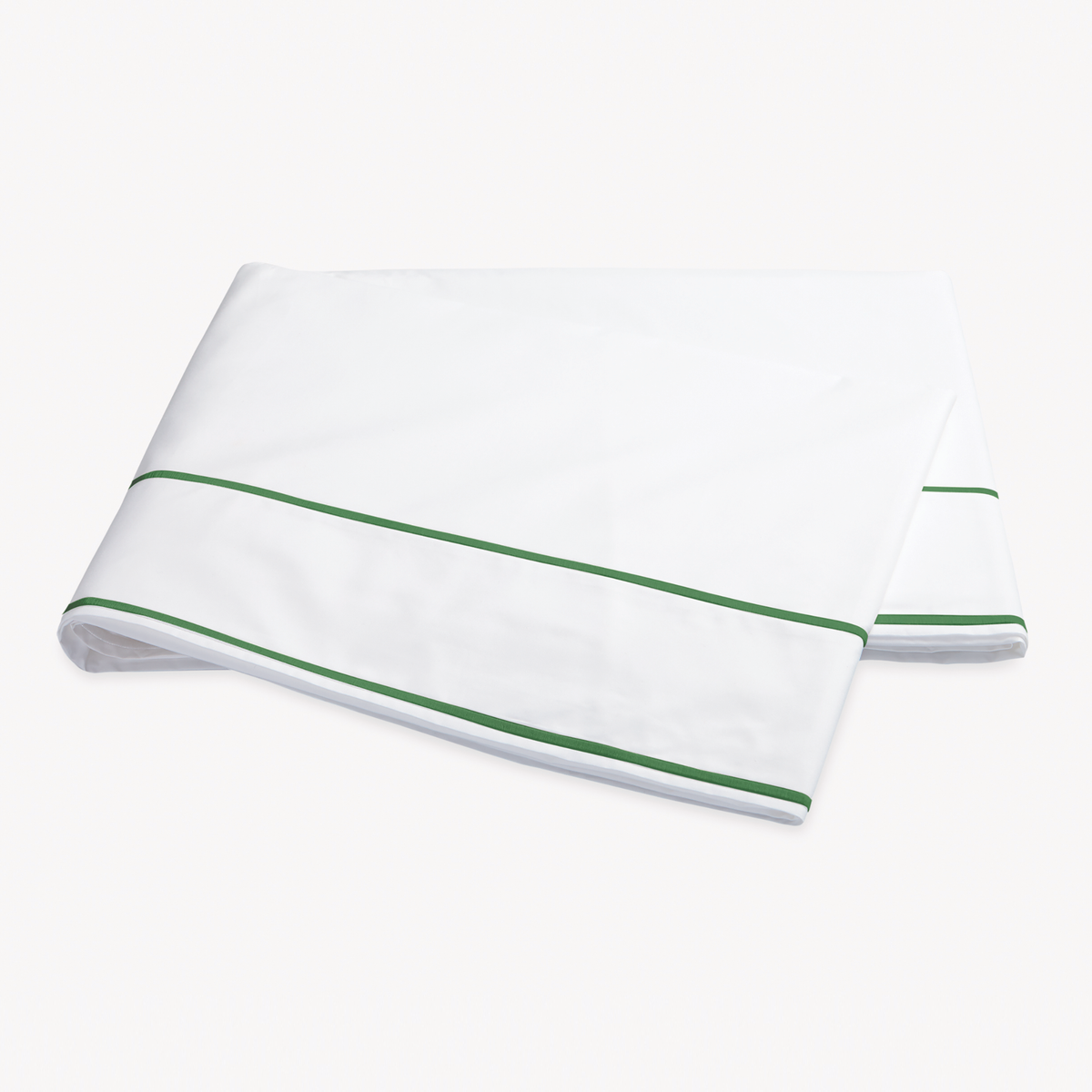 Folded Flat Sheet of Matouk Ansonia Bedding in Palm color