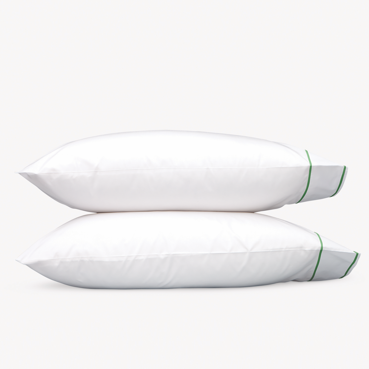 Pillowcases of Matouk Ansonia Bedding in Palm color