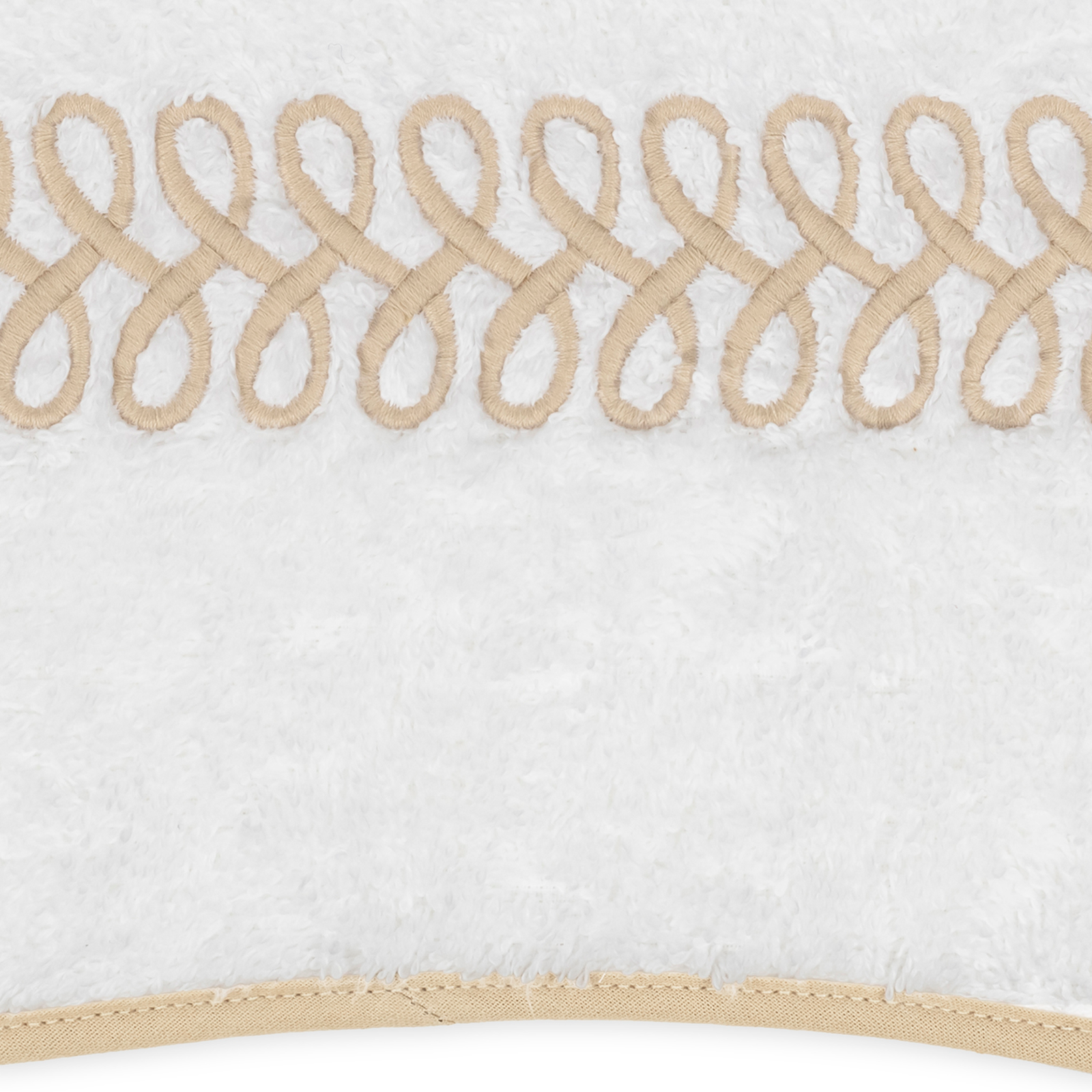 Stack of Matouk Astor Braid Bath Towels