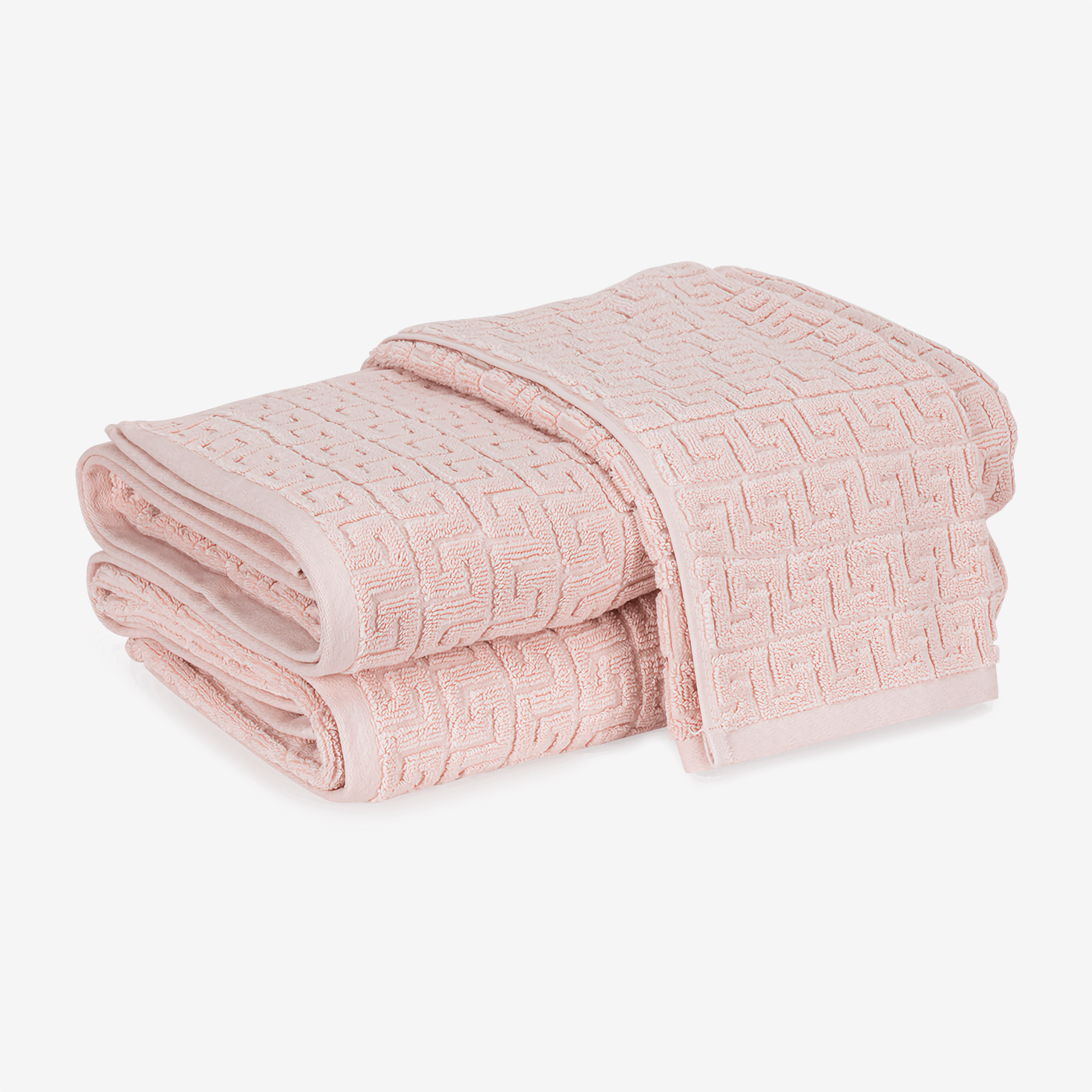 Folded Matouk Schumacher Athena Bath Towels in Blush