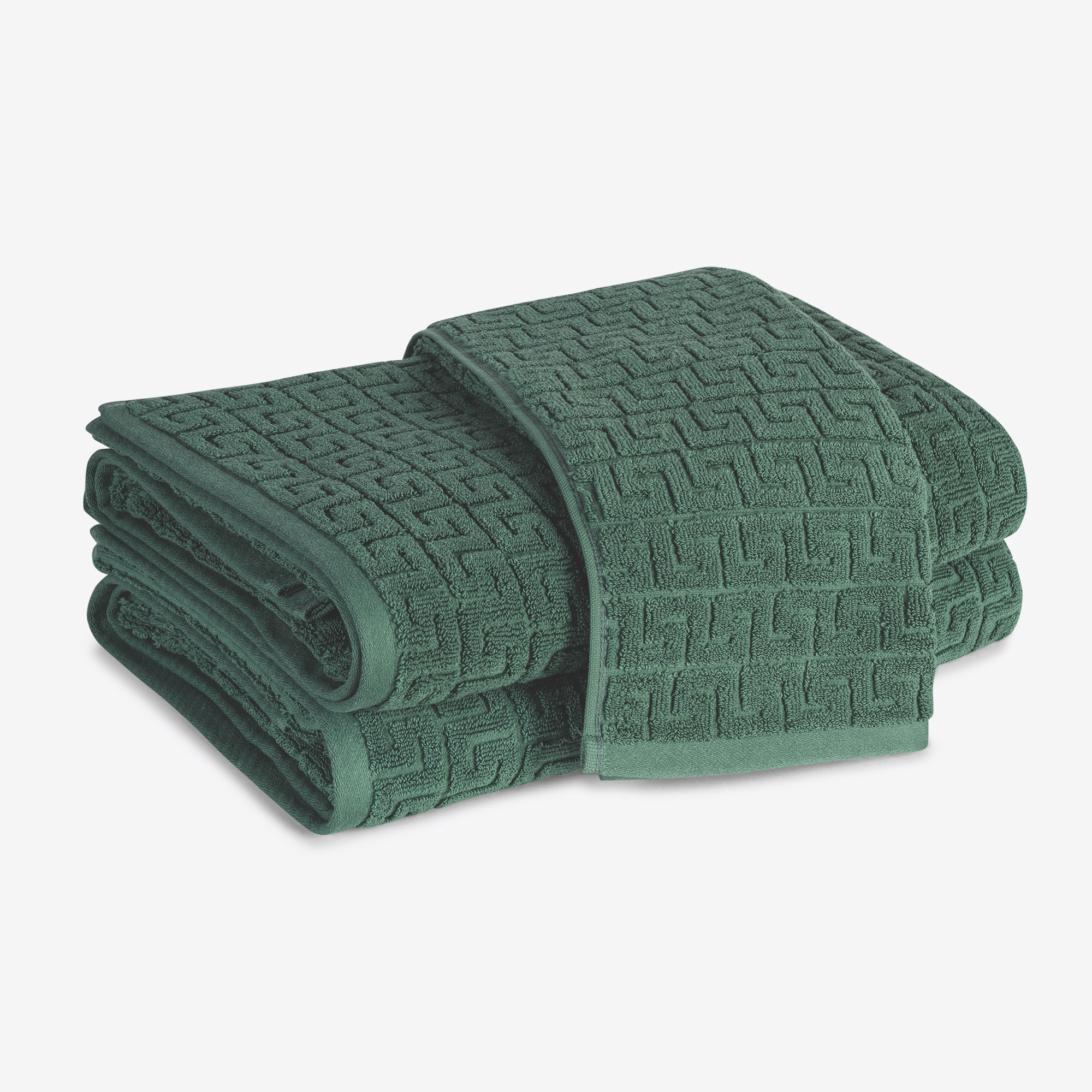 Folded Matouk Schumacher Athena Bath Towels in Jade